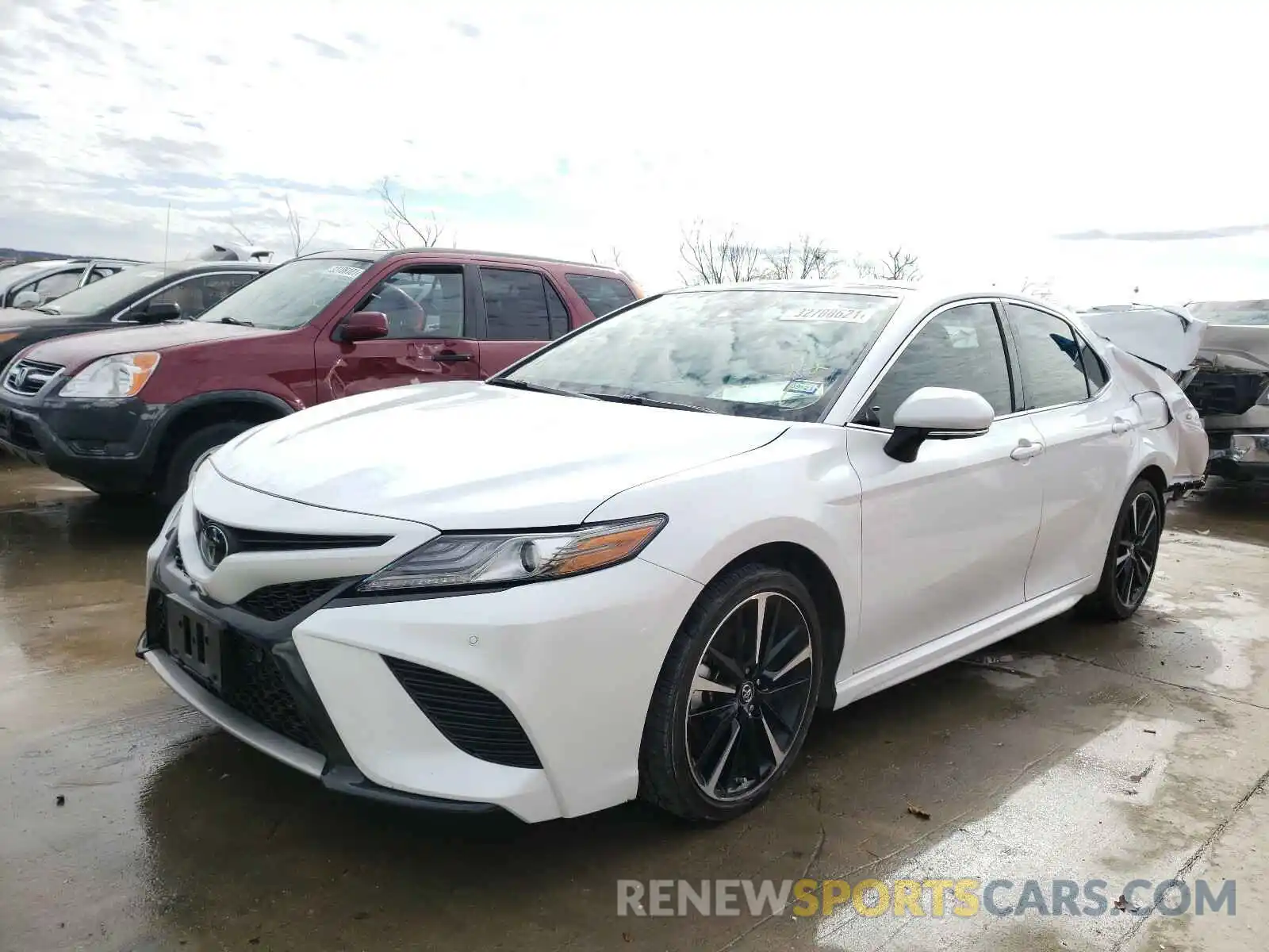 2 Photograph of a damaged car 4T1B61HK5KU296899 TOYOTA CAMRY 2019