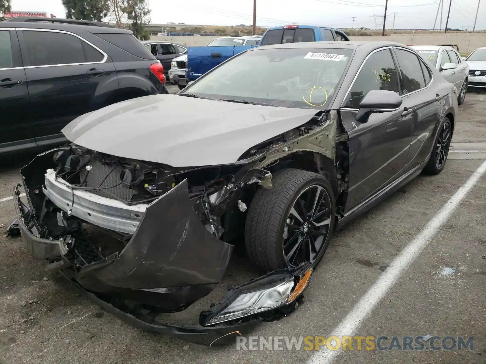 2 Photograph of a damaged car 4T1B61HK5KU754294 TOYOTA CAMRY 2019