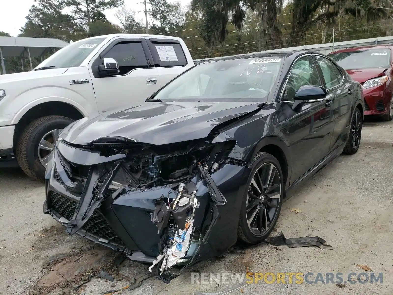 2 Photograph of a damaged car 4T1B61HK5KU807060 TOYOTA CAMRY 2019