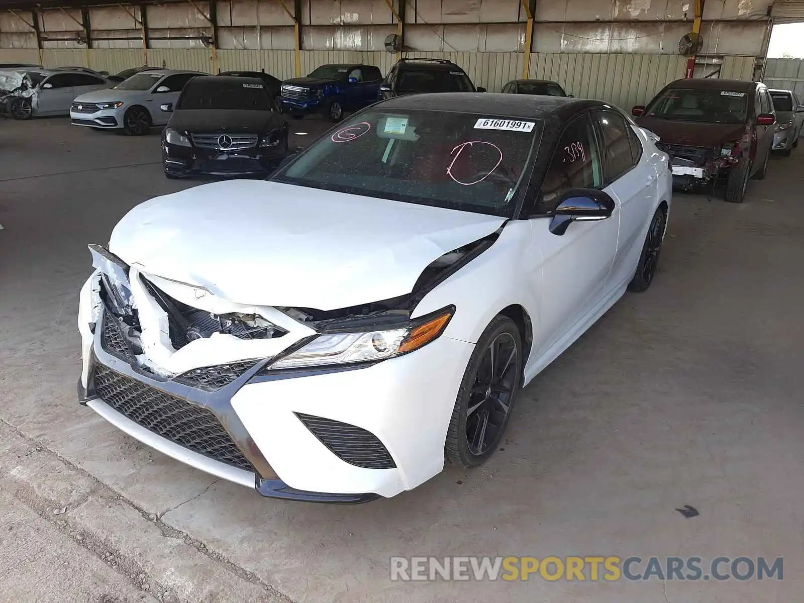 2 Photograph of a damaged car 4T1B61HK6KU213397 TOYOTA CAMRY 2019