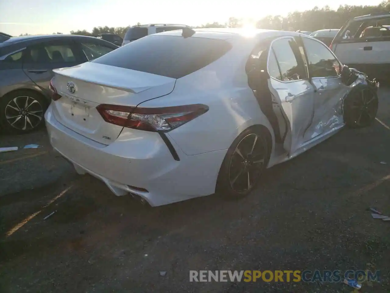 4 Photograph of a damaged car 4T1B61HK6KU731347 TOYOTA CAMRY 2019