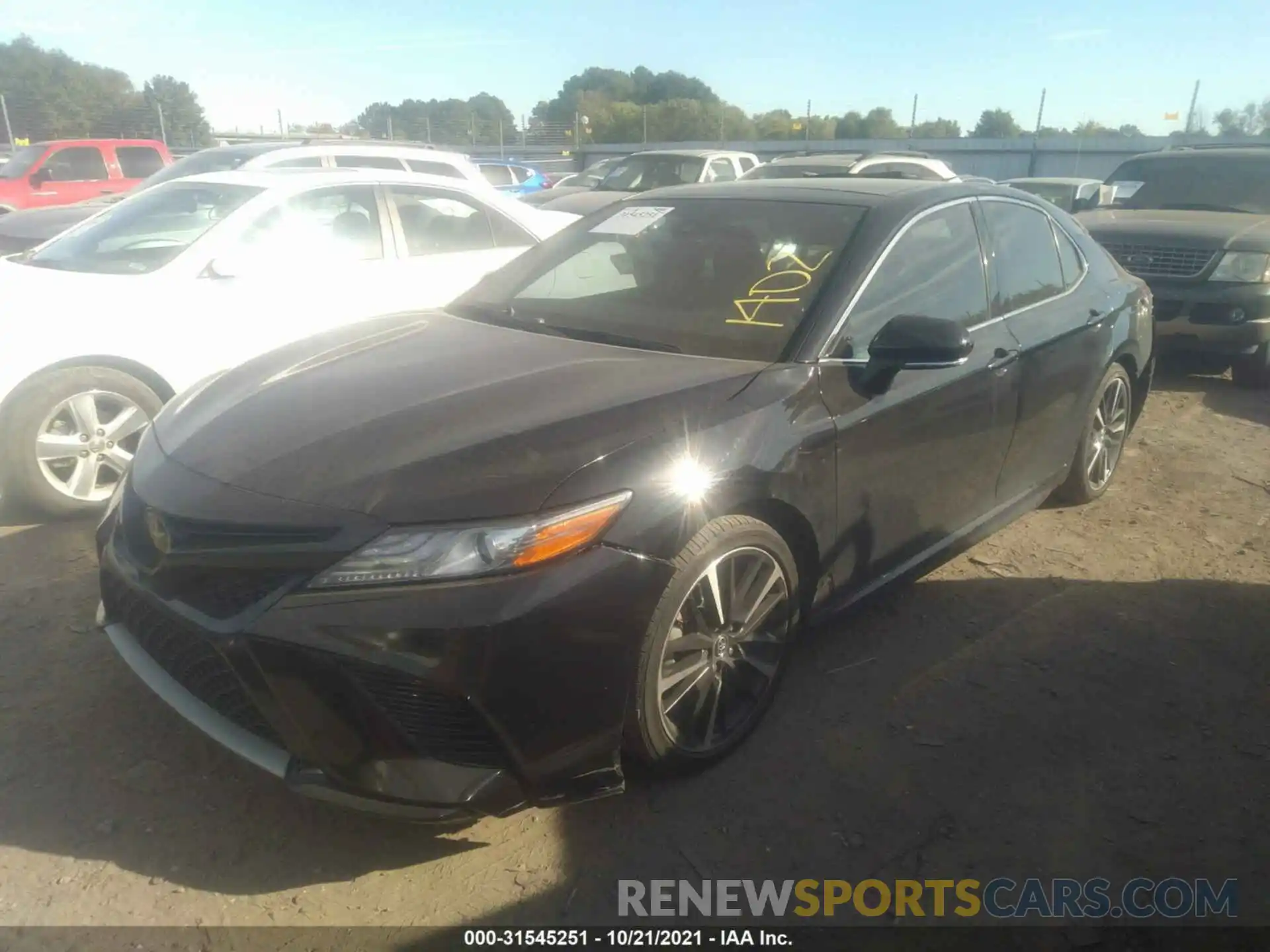 2 Photograph of a damaged car 4T1B61HK6KU812381 TOYOTA CAMRY 2019