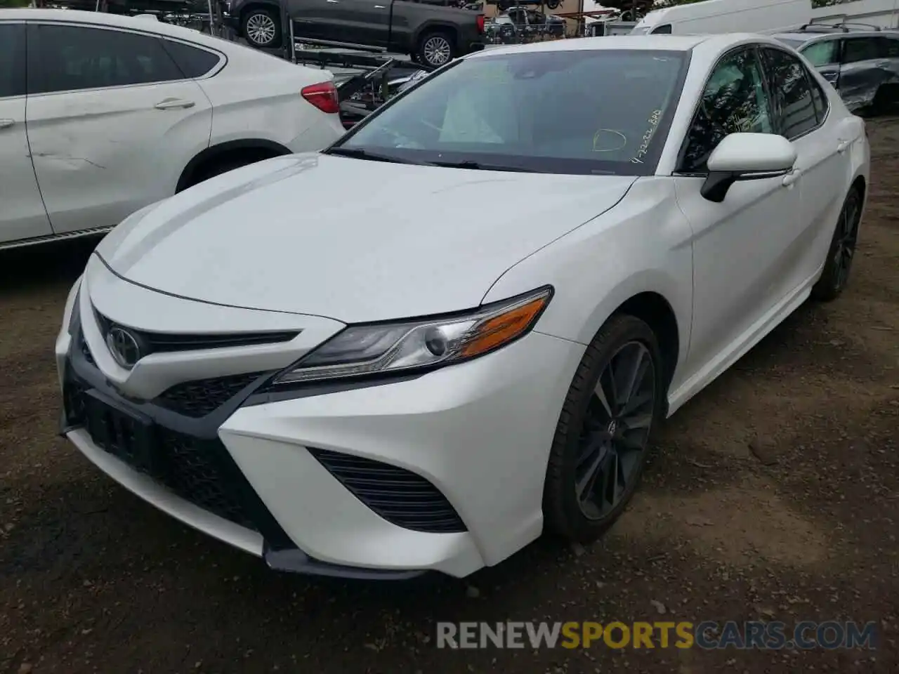 2 Photograph of a damaged car 4T1B61HK6KU833084 TOYOTA CAMRY 2019