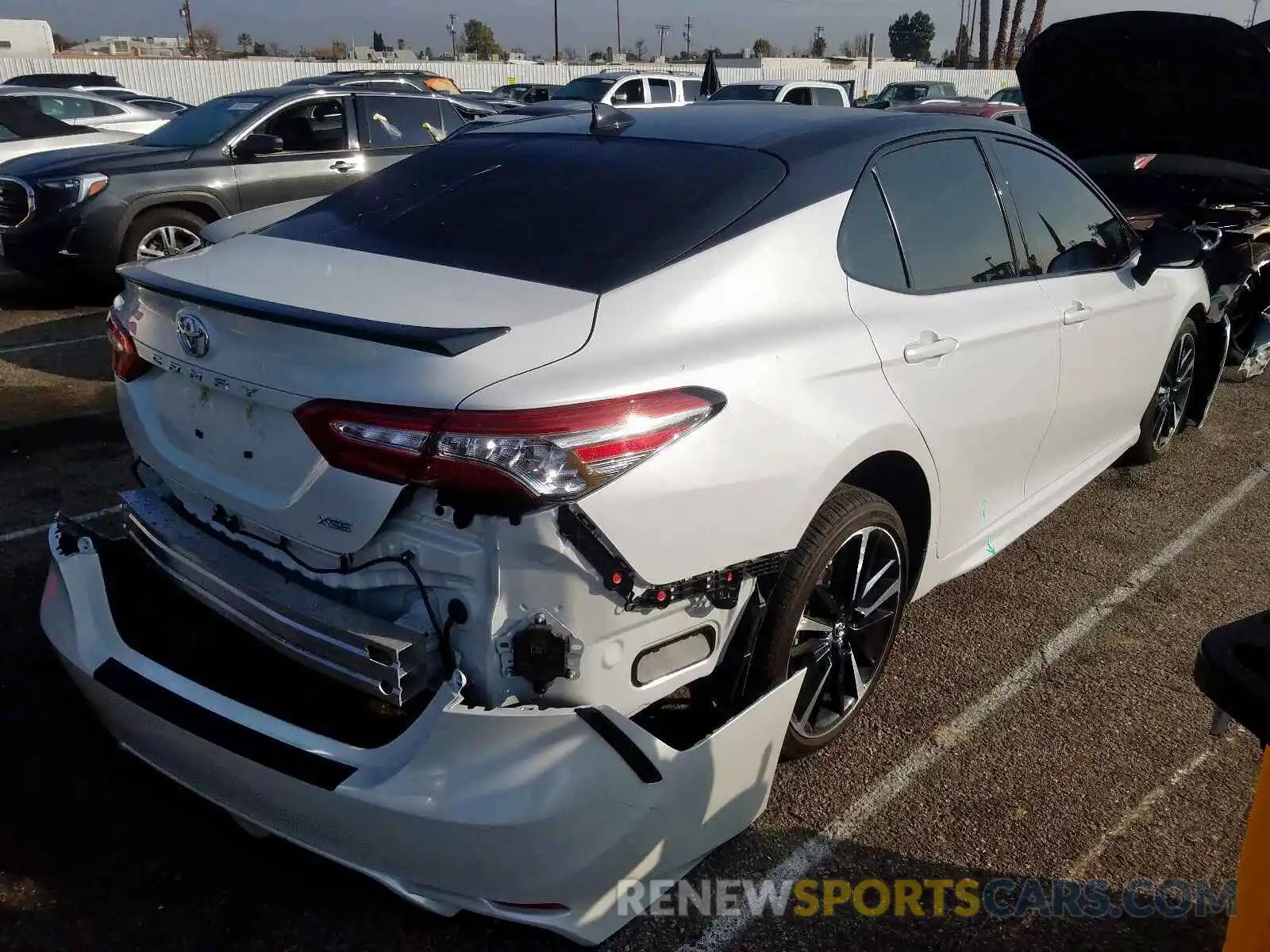 4 Photograph of a damaged car 4T1B61HK7KU281451 TOYOTA CAMRY 2019