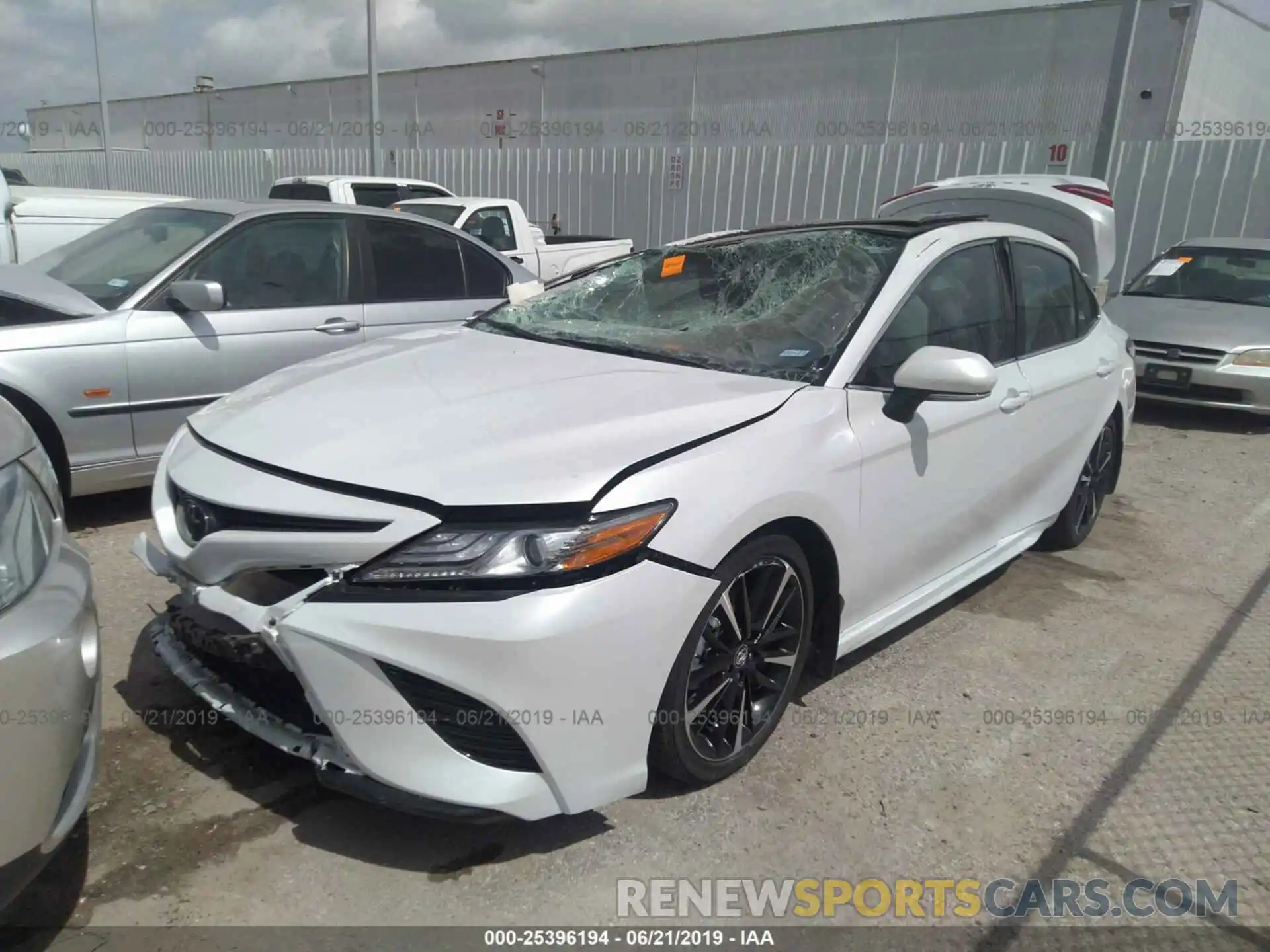 2 Photograph of a damaged car 4T1B61HK7KU748660 TOYOTA CAMRY 2019