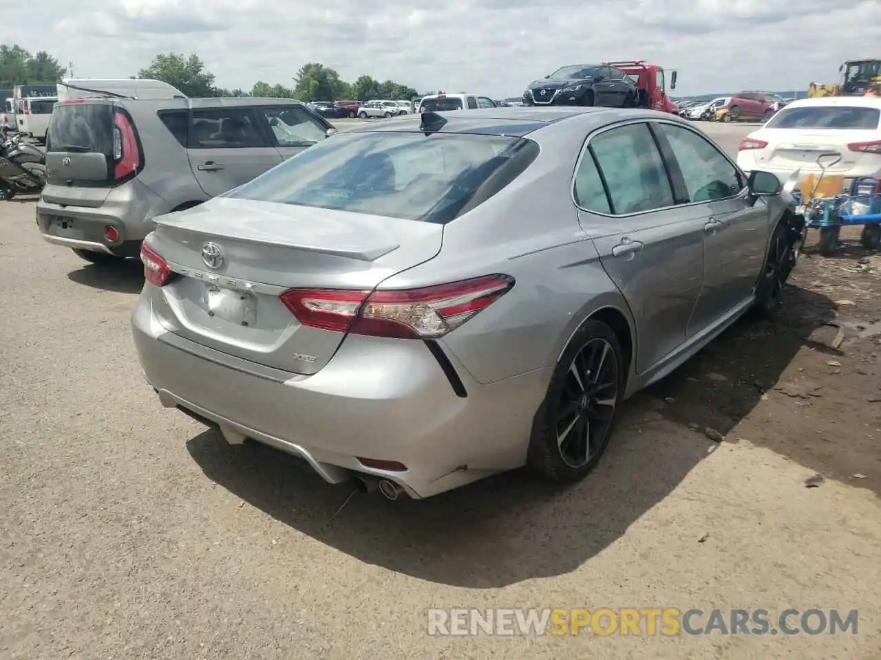 4 Photograph of a damaged car 4T1B61HK7KU828766 TOYOTA CAMRY 2019