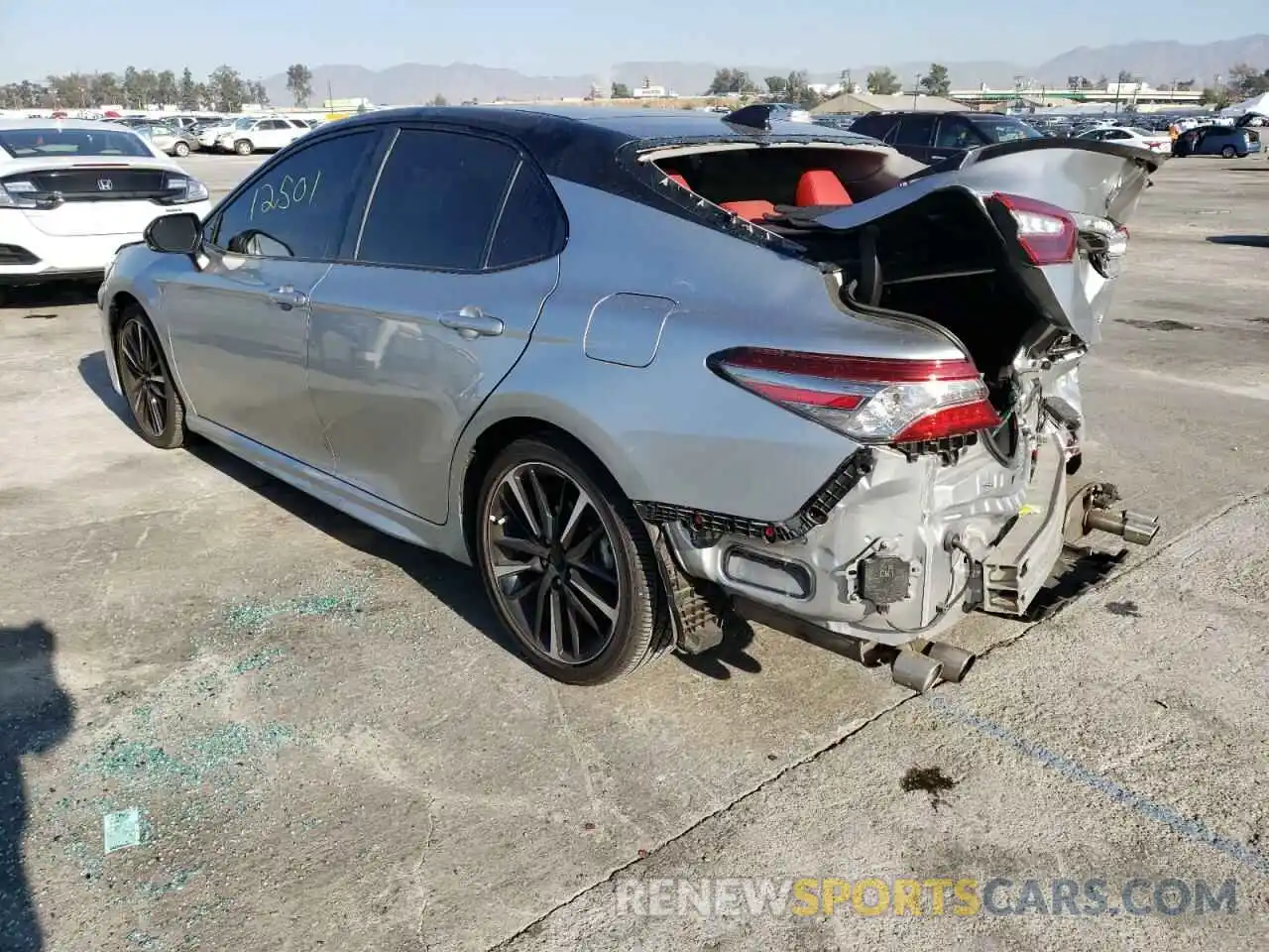 3 Photograph of a damaged car 4T1B61HK8KU257045 TOYOTA CAMRY 2019