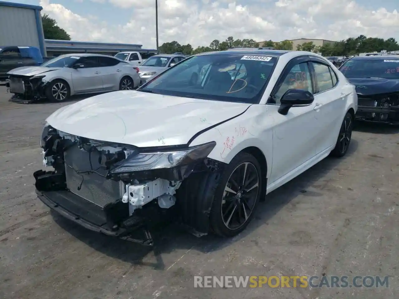 2 Photograph of a damaged car 4T1B61HK8KU821938 TOYOTA CAMRY 2019