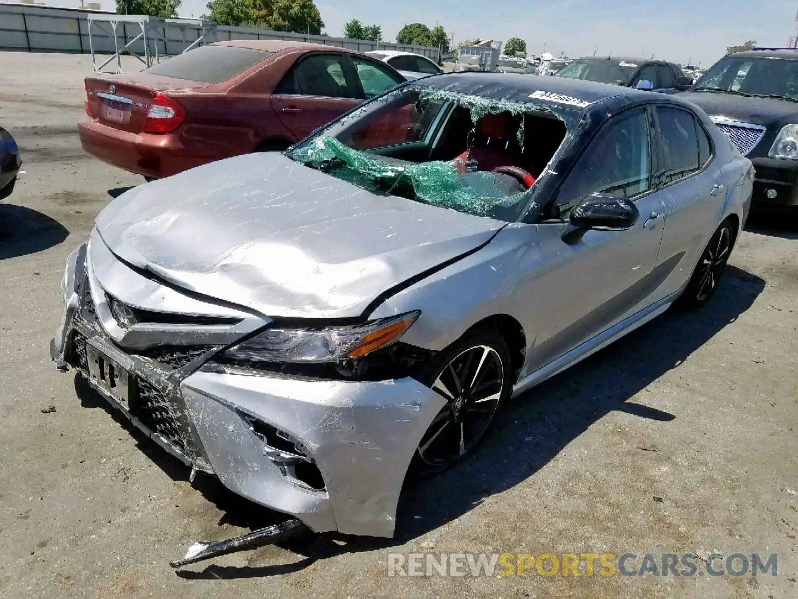 2 Photograph of a damaged car 4T1B61HK9KU198703 TOYOTA CAMRY 2019