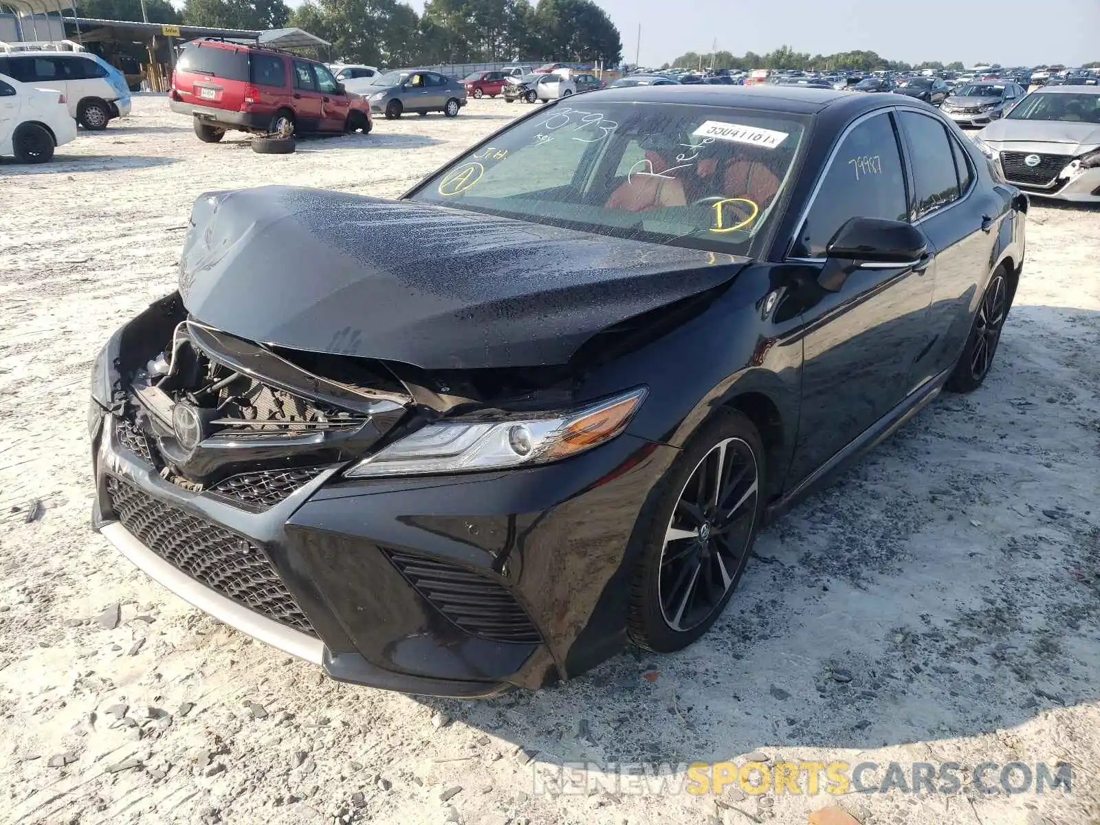 2 Photograph of a damaged car 4T1B61HK9KU799593 TOYOTA CAMRY 2019