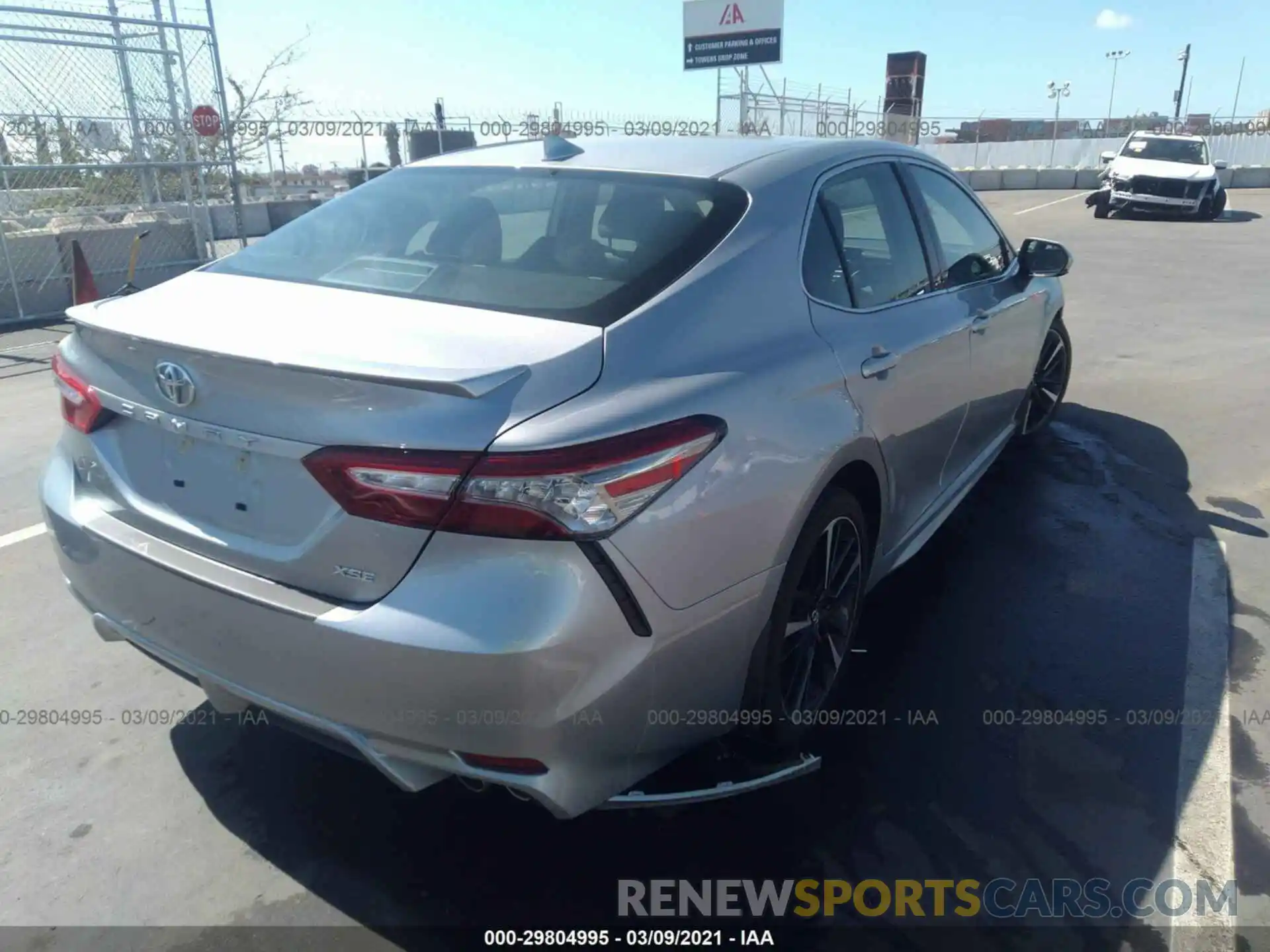 4 Photograph of a damaged car 4T1B61HK9KU817705 TOYOTA CAMRY 2019