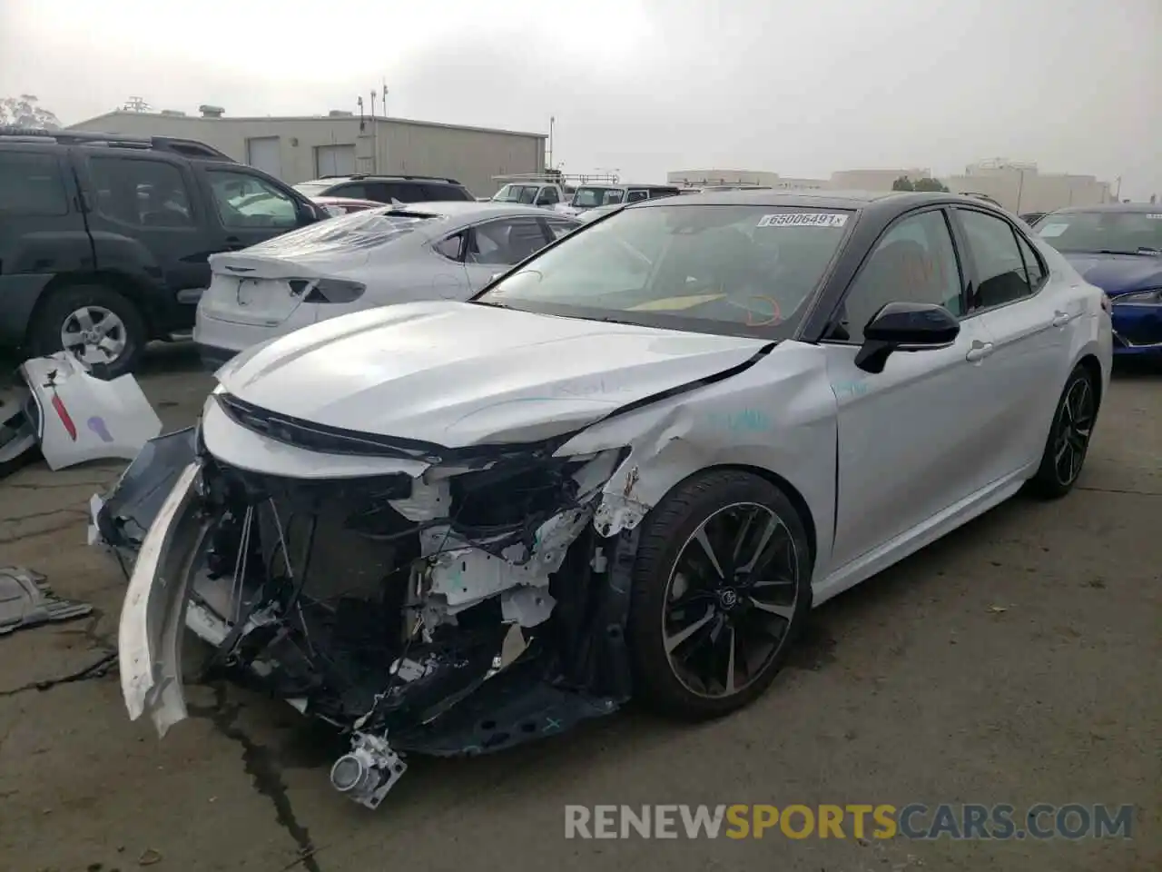 2 Photograph of a damaged car 4T1B61HKXKU199195 TOYOTA CAMRY 2019