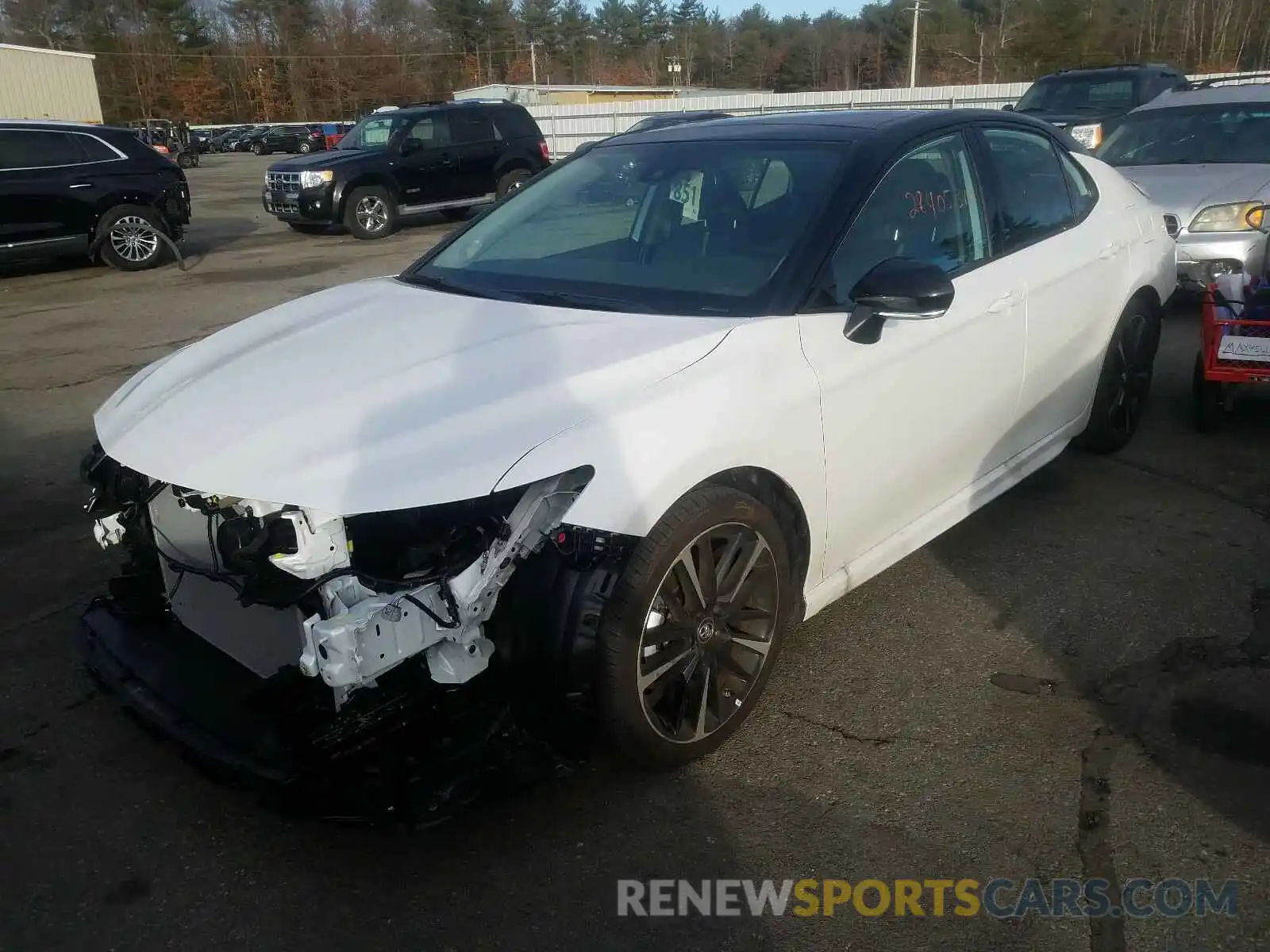 2 Photograph of a damaged car 4T1B61HKXKU273392 TOYOTA CAMRY 2019