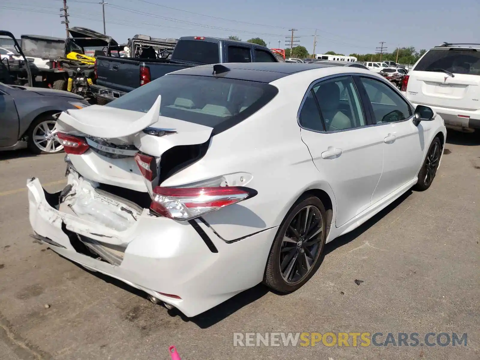 4 Photograph of a damaged car 4T1B61HKXKU813212 TOYOTA CAMRY 2019