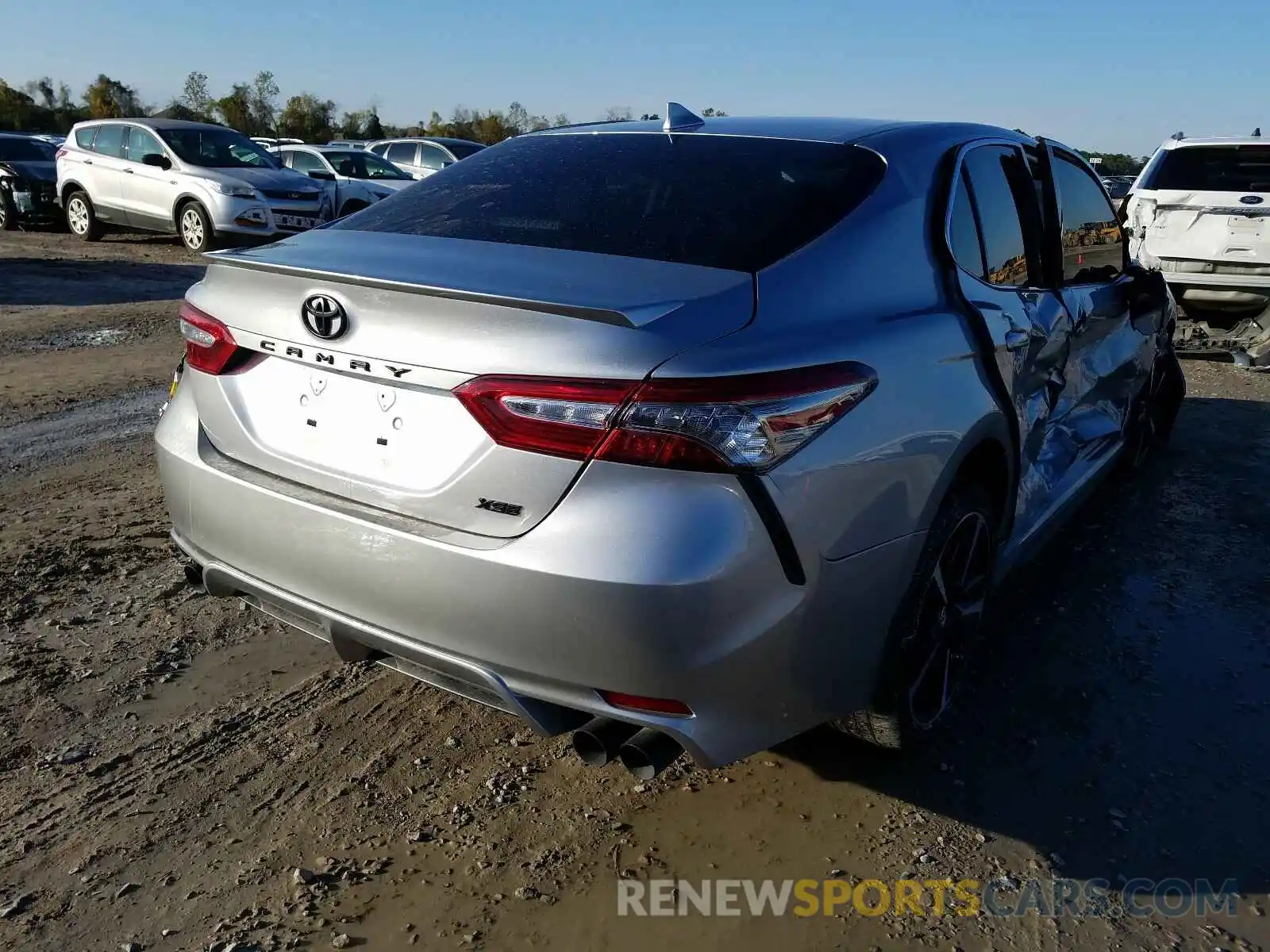 4 Photograph of a damaged car 4T1B61HKXKU837994 TOYOTA CAMRY 2019