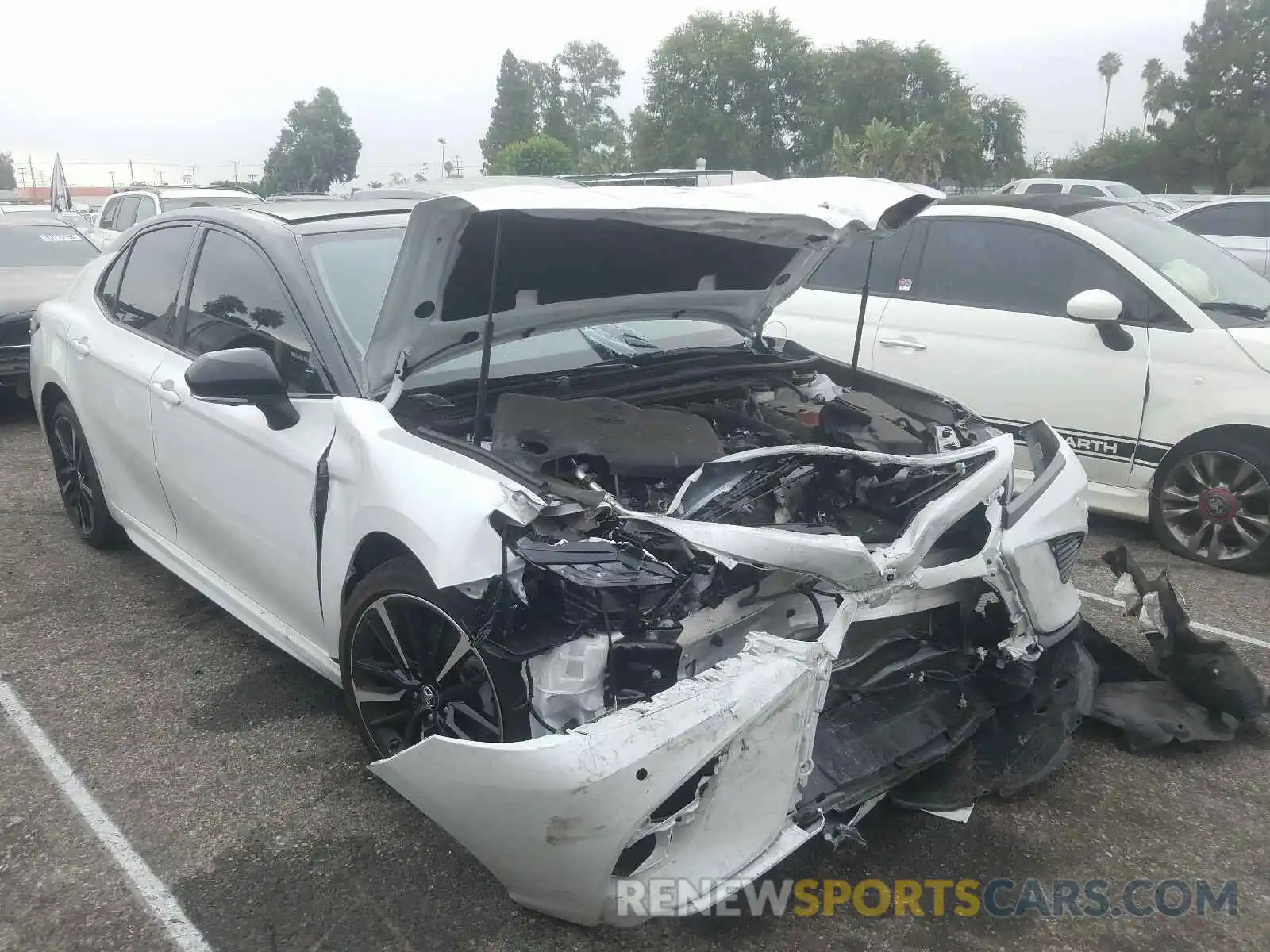 1 Photograph of a damaged car 4T1BZ1HK0KU023442 TOYOTA CAMRY 2019