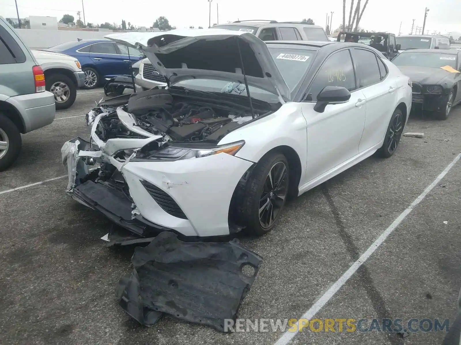 2 Photograph of a damaged car 4T1BZ1HK0KU023442 TOYOTA CAMRY 2019