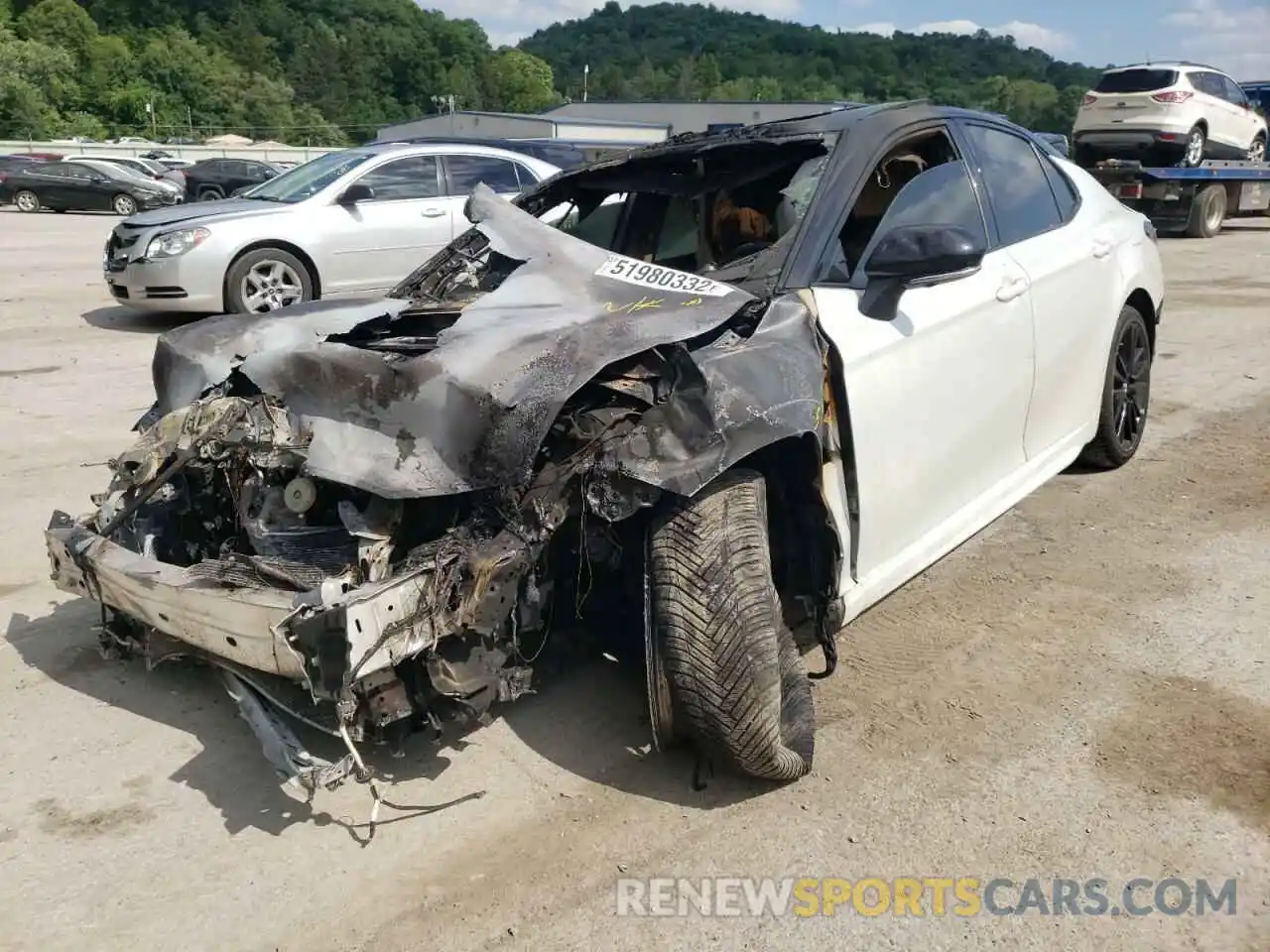 2 Photograph of a damaged car 4T1BZ1HK0KU023554 TOYOTA CAMRY 2019