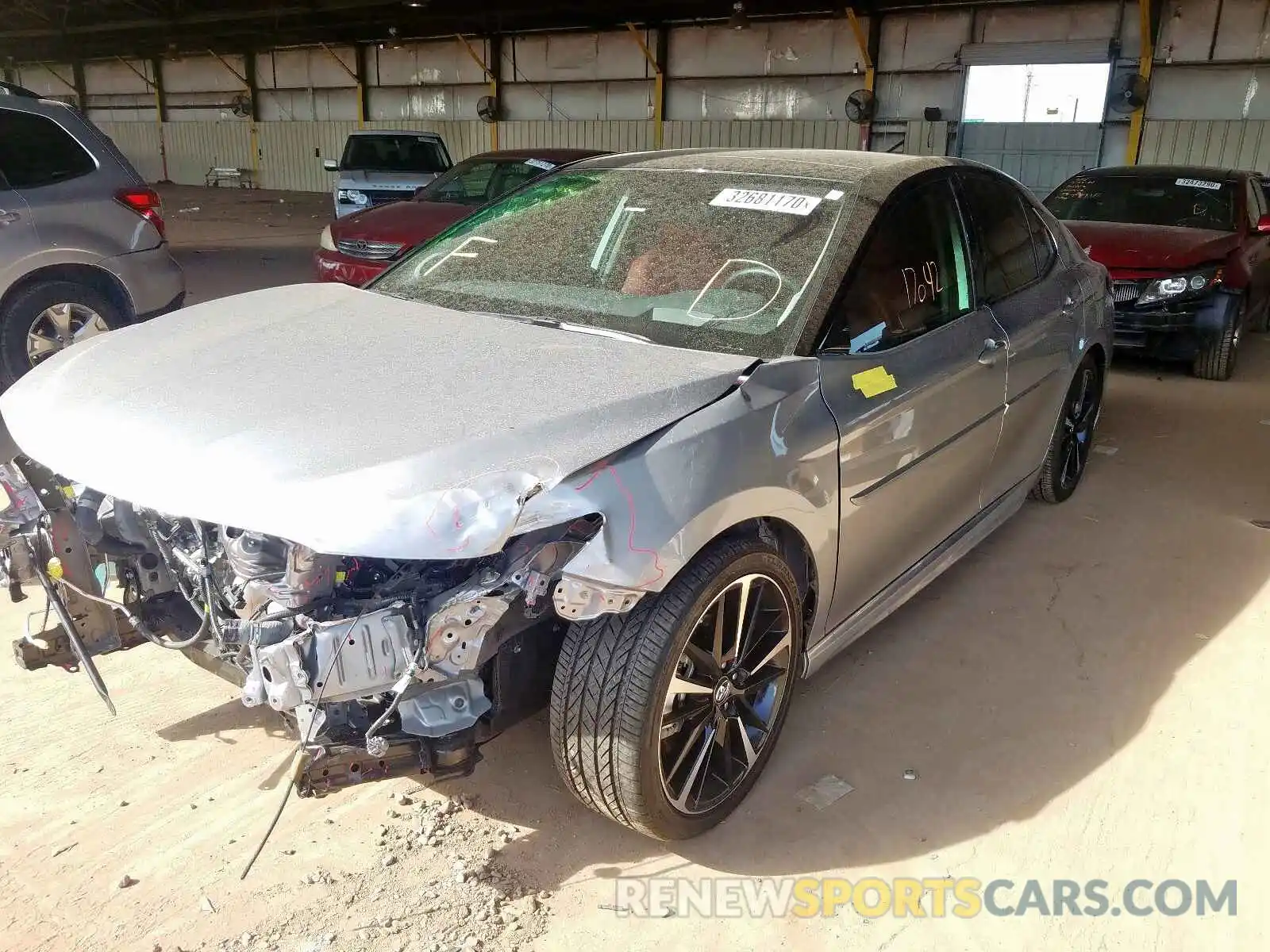 2 Photograph of a damaged car 4T1BZ1HK0KU024249 TOYOTA CAMRY 2019