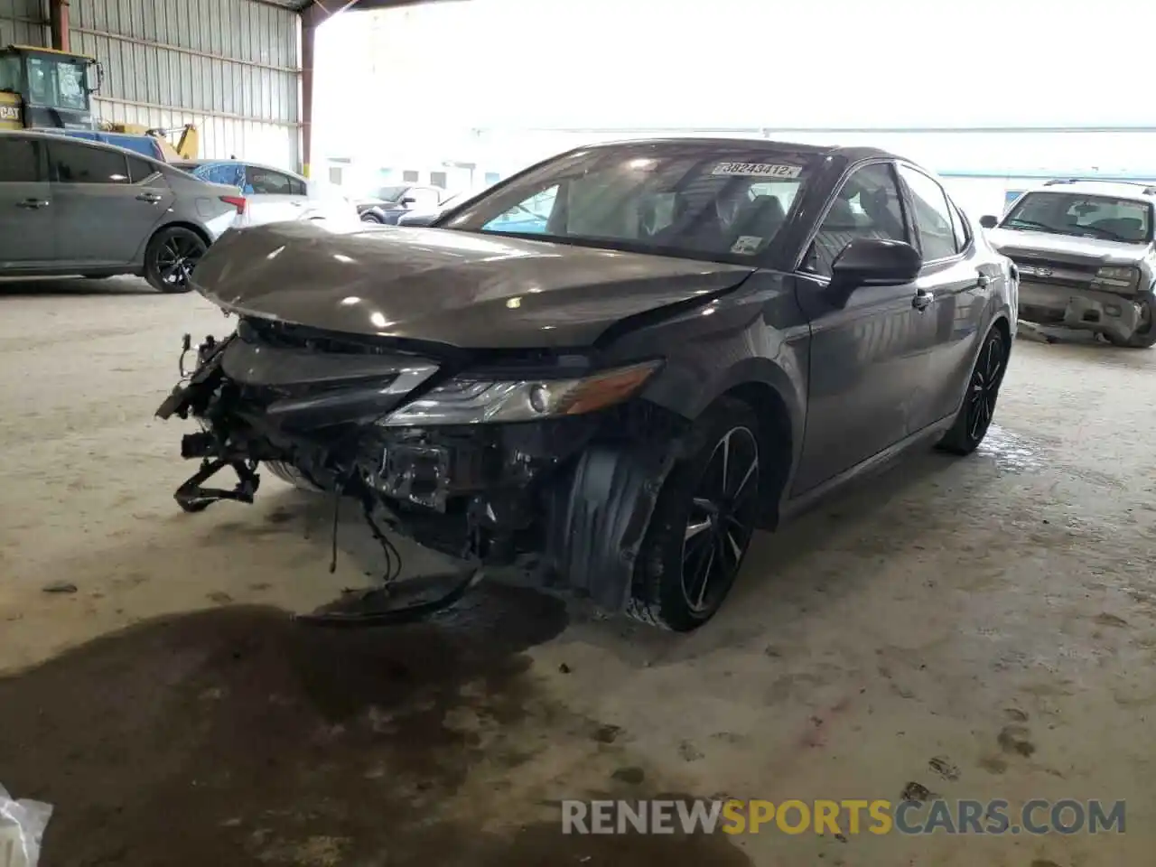 2 Photograph of a damaged car 4T1BZ1HK0KU028558 TOYOTA CAMRY 2019