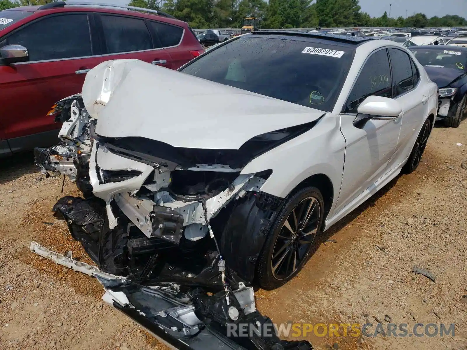 2 Photograph of a damaged car 4T1BZ1HK0KU029628 TOYOTA CAMRY 2019