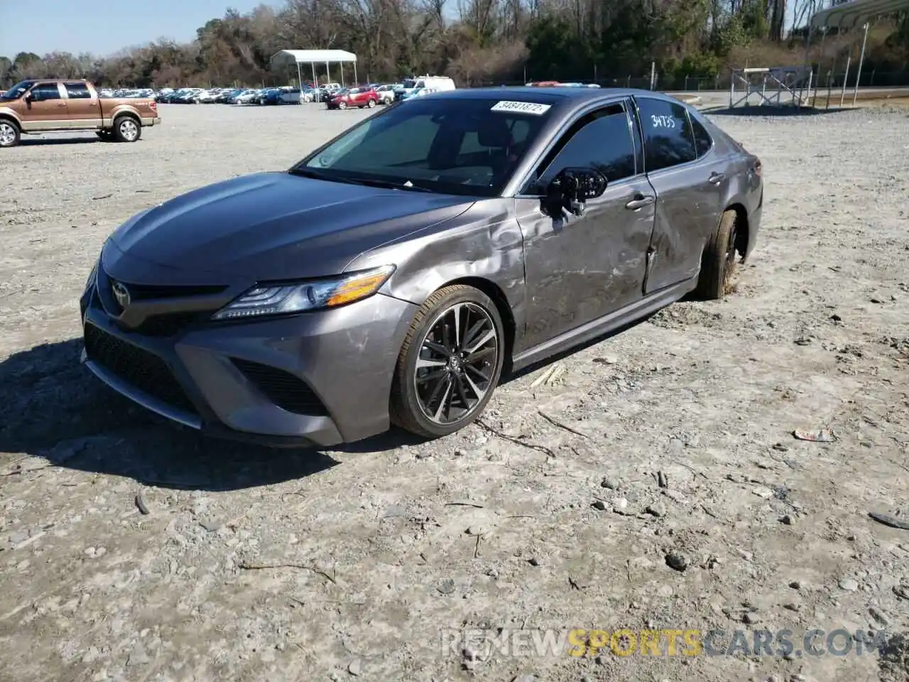 2 Photograph of a damaged car 4T1BZ1HK0KU029984 TOYOTA CAMRY 2019