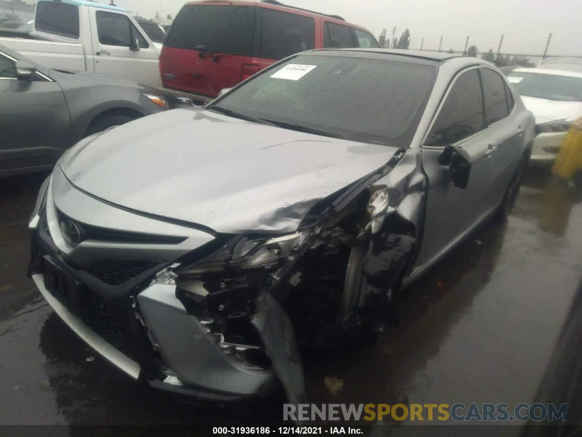 2 Photograph of a damaged car 4T1BZ1HK0KU030004 TOYOTA CAMRY 2019