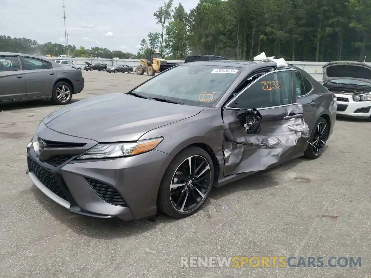 2 Photograph of a damaged car 4T1BZ1HK0KU030682 TOYOTA CAMRY 2019