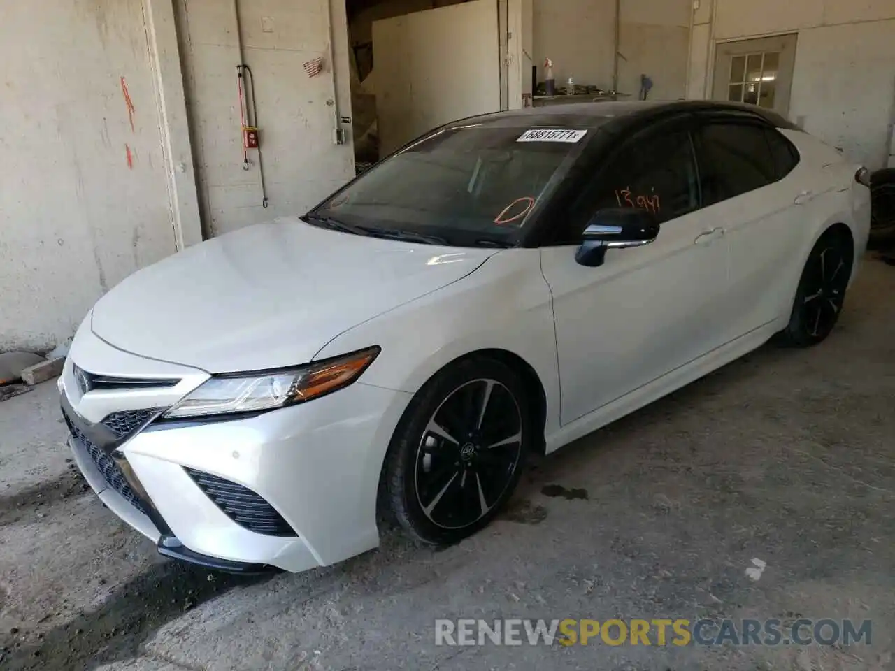 2 Photograph of a damaged car 4T1BZ1HK0KU032139 TOYOTA CAMRY 2019