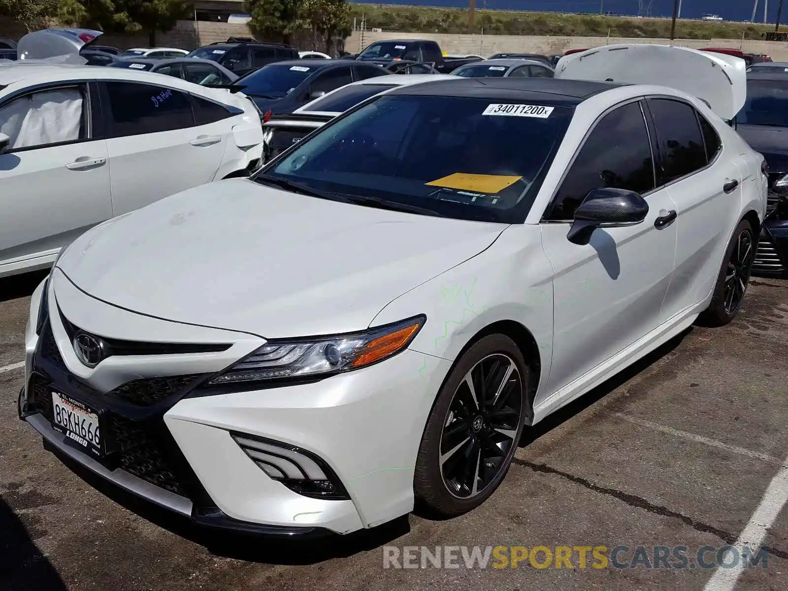 2 Photograph of a damaged car 4T1BZ1HK0KU507014 TOYOTA CAMRY 2019