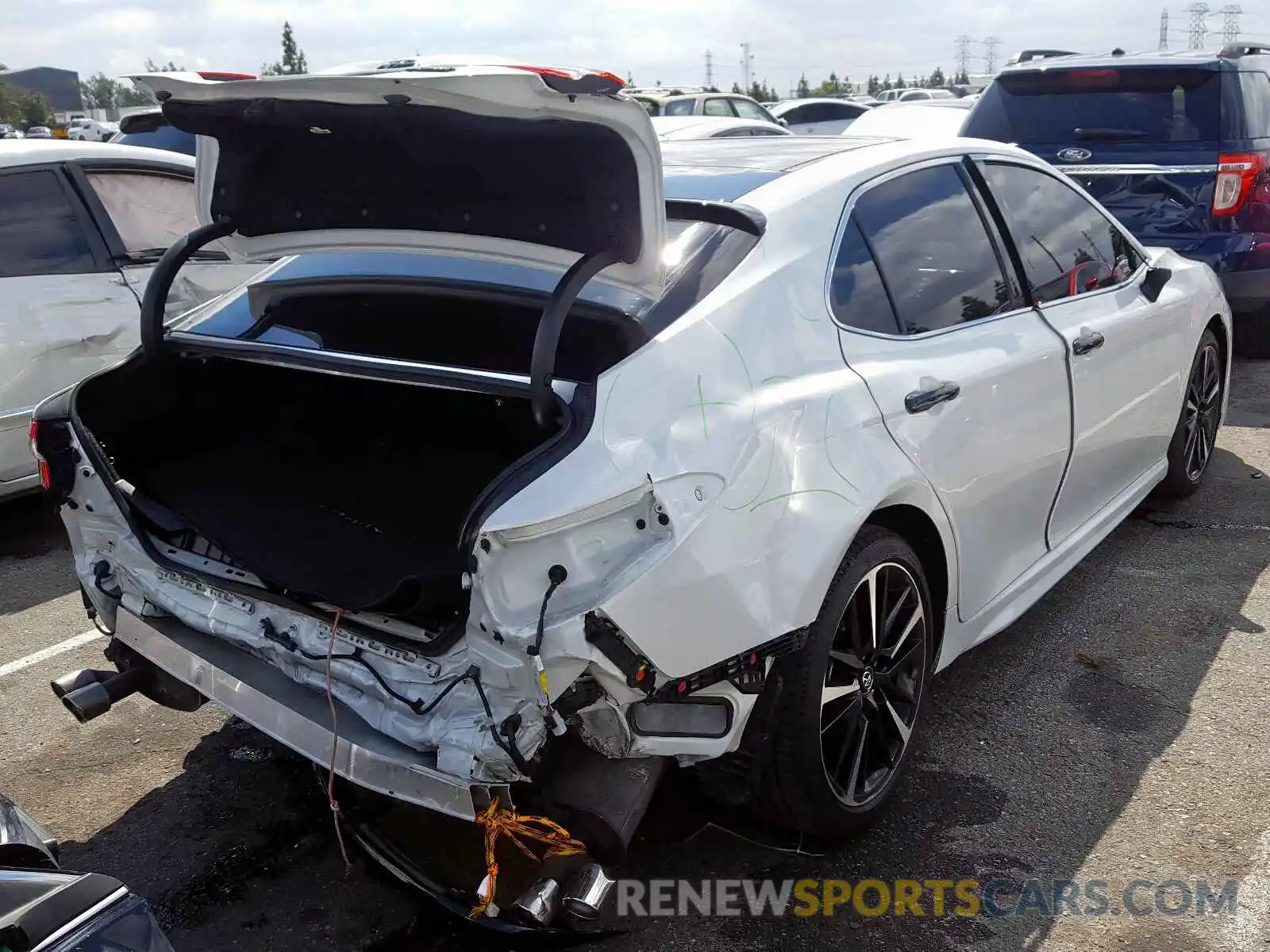 4 Photograph of a damaged car 4T1BZ1HK0KU507014 TOYOTA CAMRY 2019