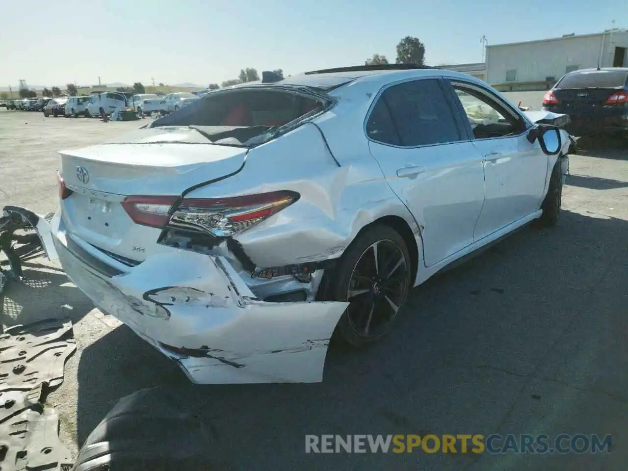 4 Photograph of a damaged car 4T1BZ1HK0KU508986 TOYOTA CAMRY 2019