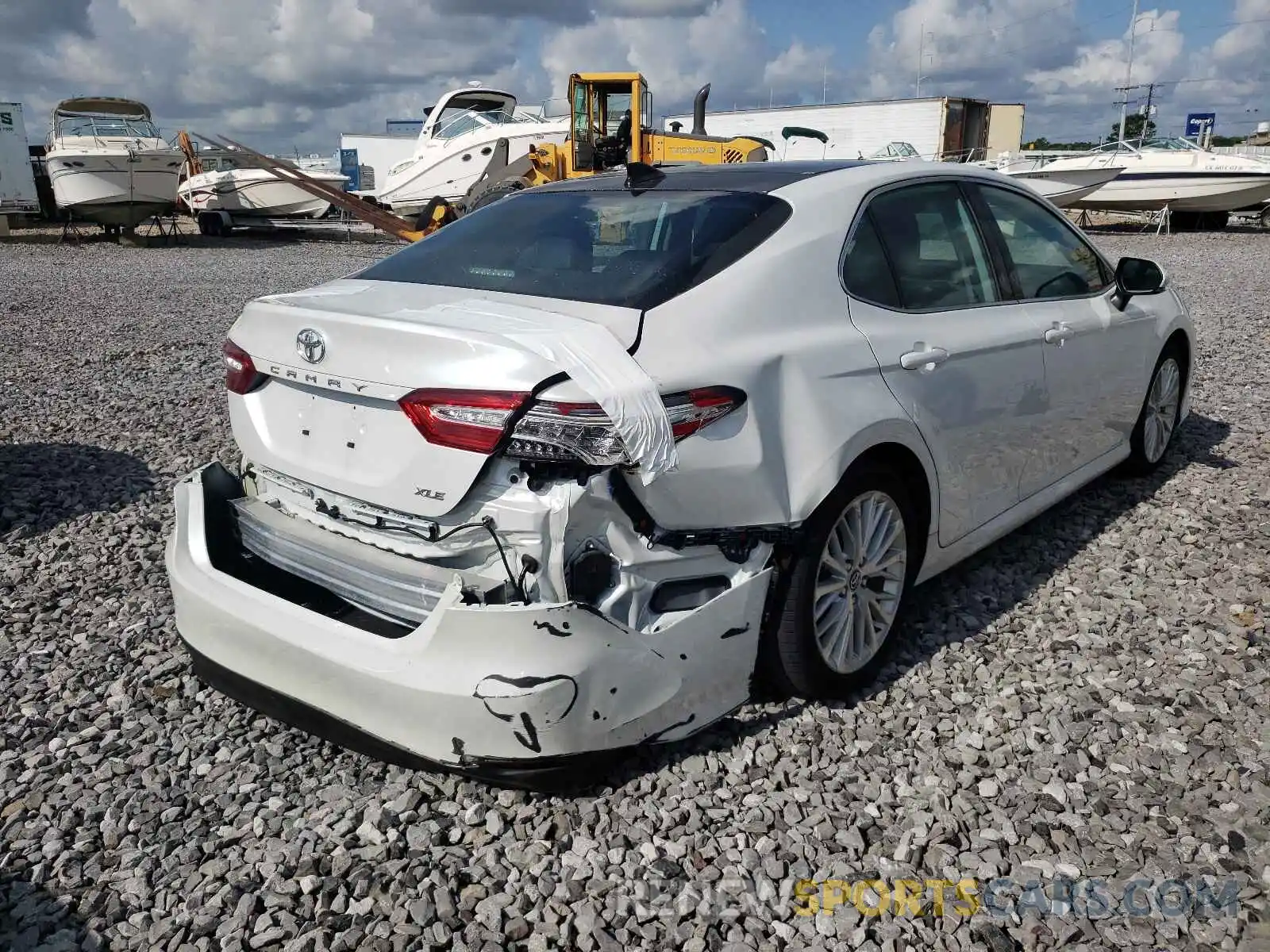 4 Photograph of a damaged car 4T1BZ1HK0KU509474 TOYOTA CAMRY 2019