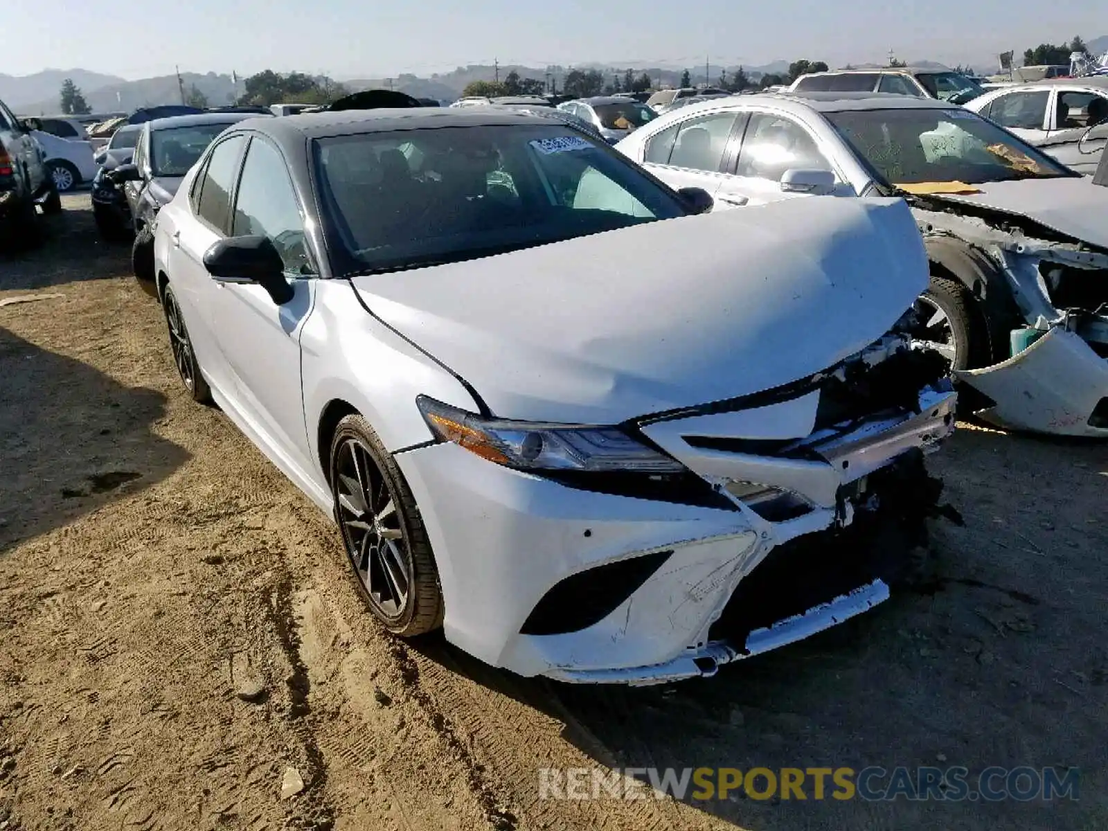 1 Photograph of a damaged car 4T1BZ1HK1KU025877 TOYOTA CAMRY 2019