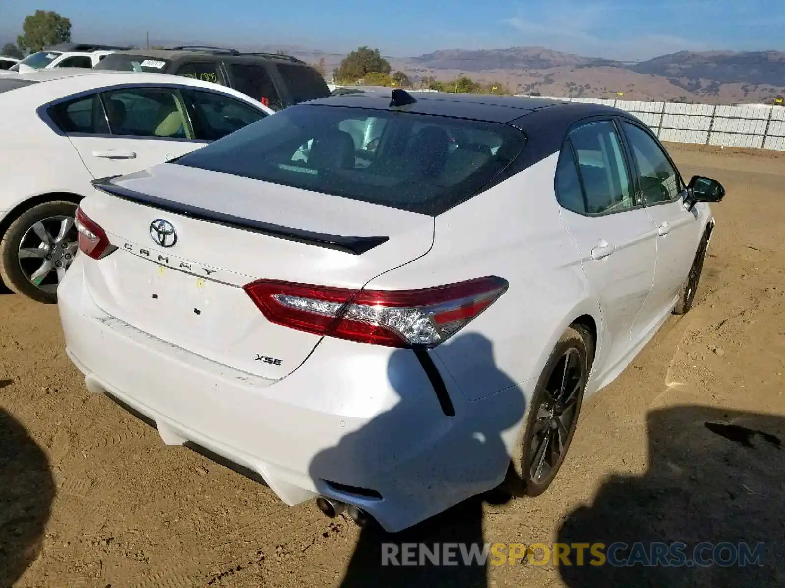 4 Photograph of a damaged car 4T1BZ1HK1KU025877 TOYOTA CAMRY 2019