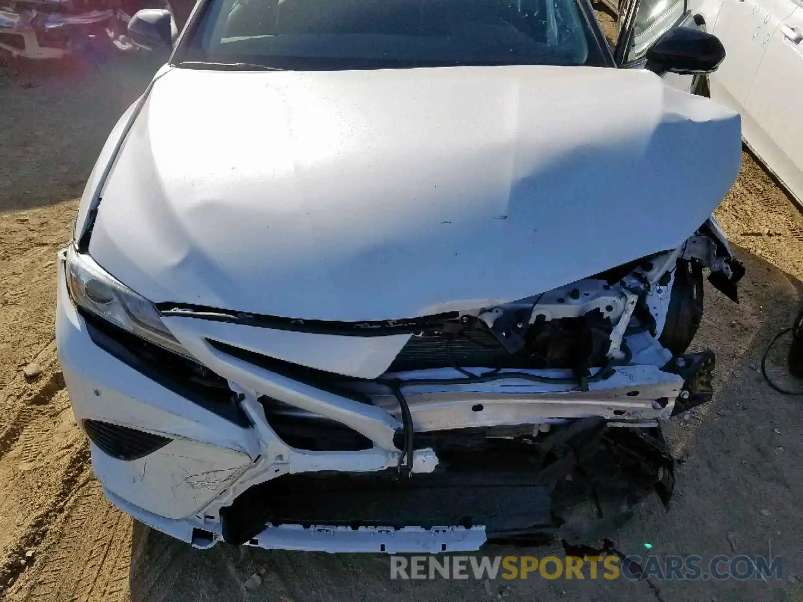 7 Photograph of a damaged car 4T1BZ1HK1KU025877 TOYOTA CAMRY 2019