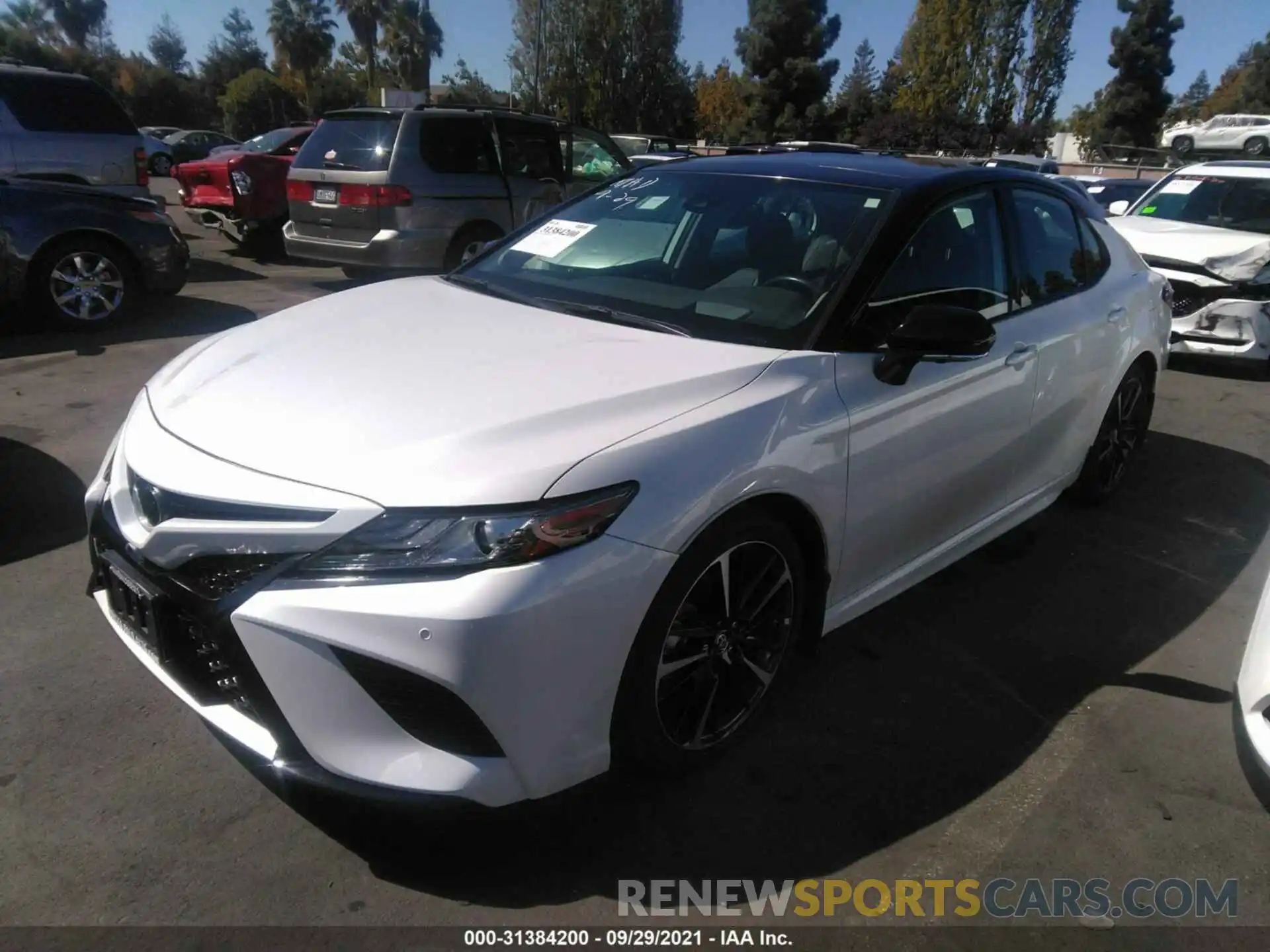 2 Photograph of a damaged car 4T1BZ1HK1KU027399 TOYOTA CAMRY 2019