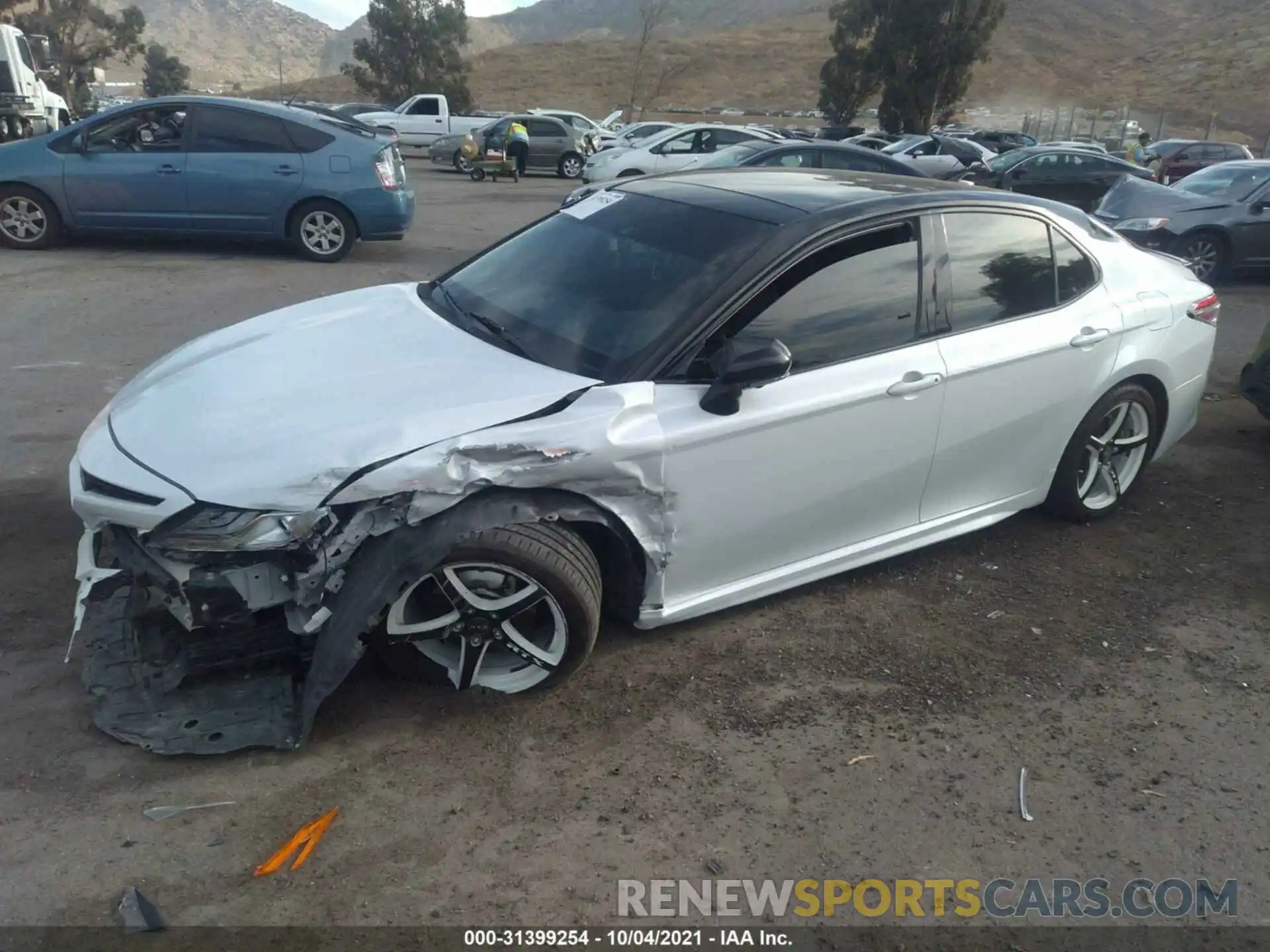 2 Photograph of a damaged car 4T1BZ1HK1KU027659 TOYOTA CAMRY 2019