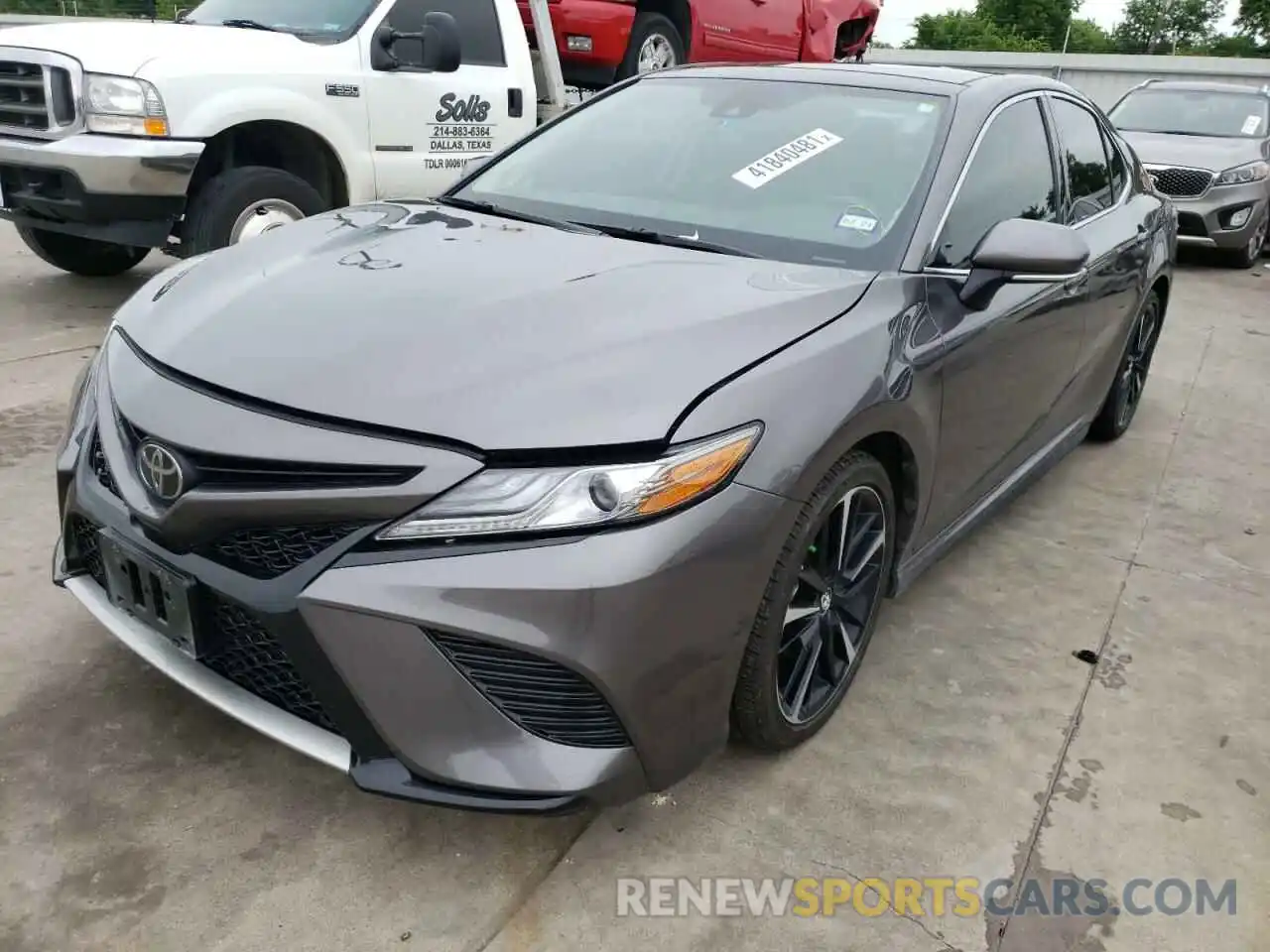 2 Photograph of a damaged car 4T1BZ1HK1KU029136 TOYOTA CAMRY 2019