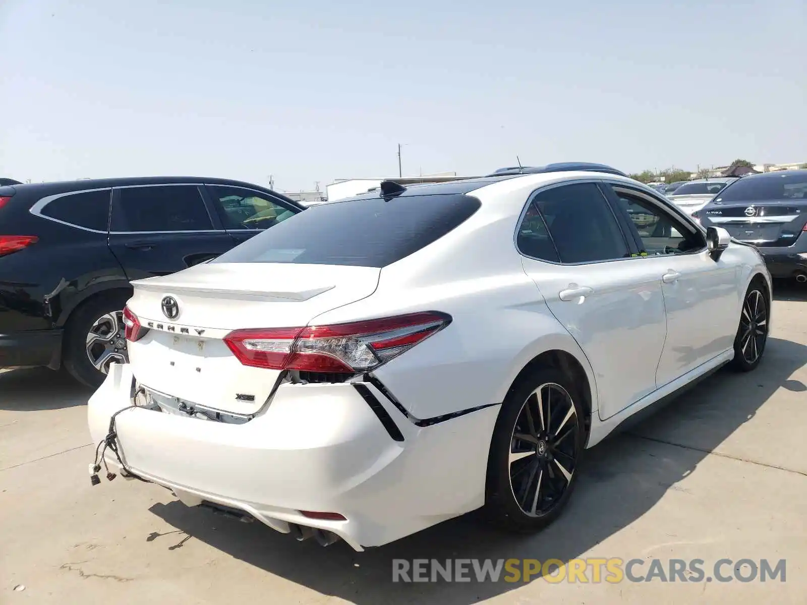 4 Photograph of a damaged car 4T1BZ1HK1KU029315 TOYOTA CAMRY 2019