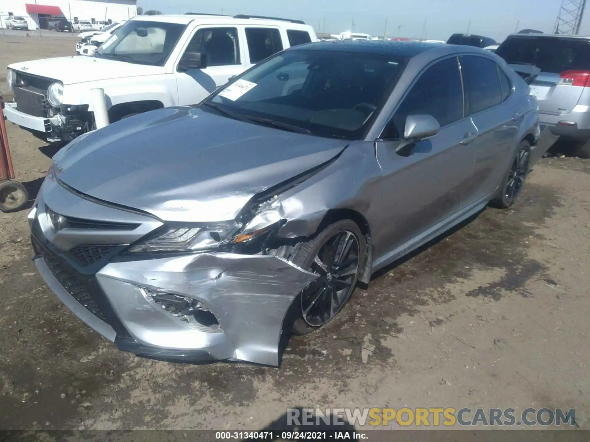 2 Photograph of a damaged car 4T1BZ1HK1KU509676 TOYOTA CAMRY 2019