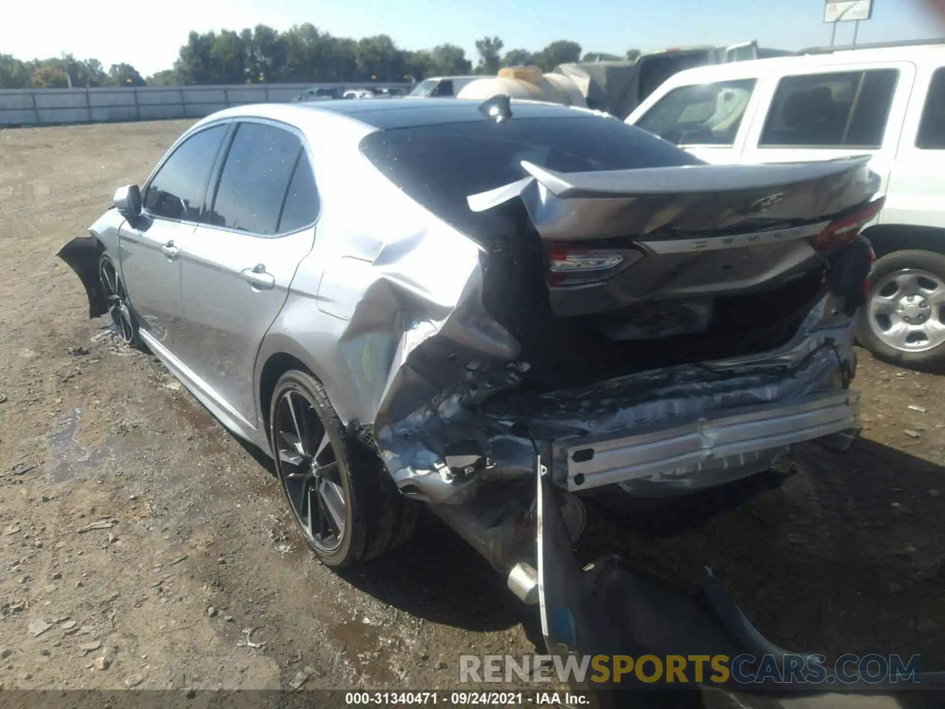 3 Photograph of a damaged car 4T1BZ1HK1KU509676 TOYOTA CAMRY 2019