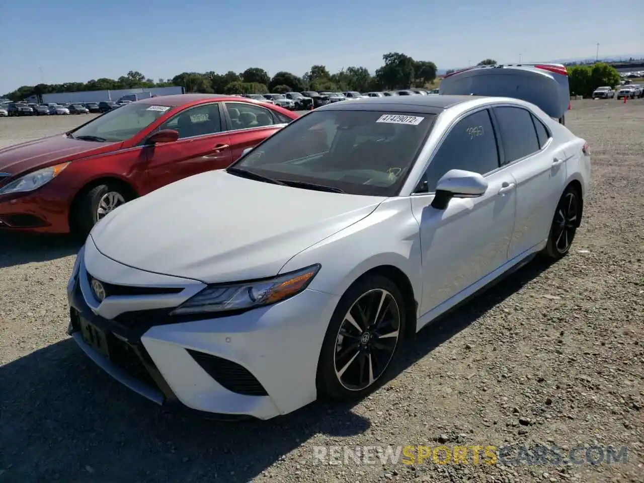 2 Photograph of a damaged car 4T1BZ1HK1KU509774 TOYOTA CAMRY 2019