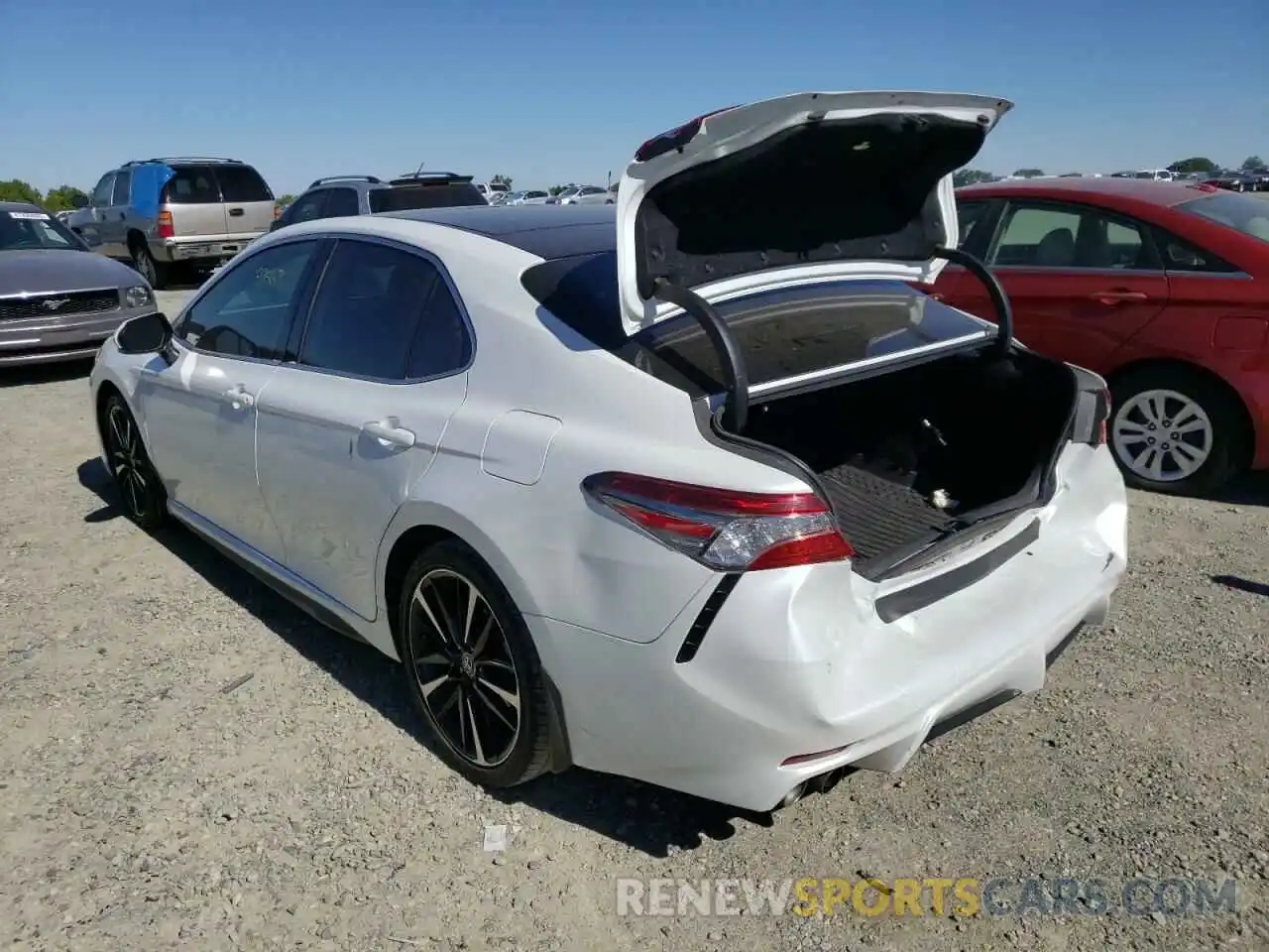 3 Photograph of a damaged car 4T1BZ1HK1KU509774 TOYOTA CAMRY 2019