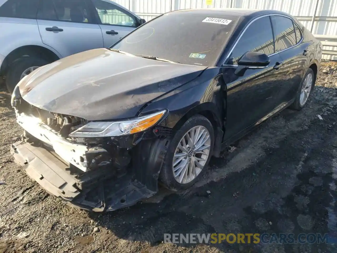 2 Photograph of a damaged car 4T1BZ1HK2KU023619 TOYOTA CAMRY 2019