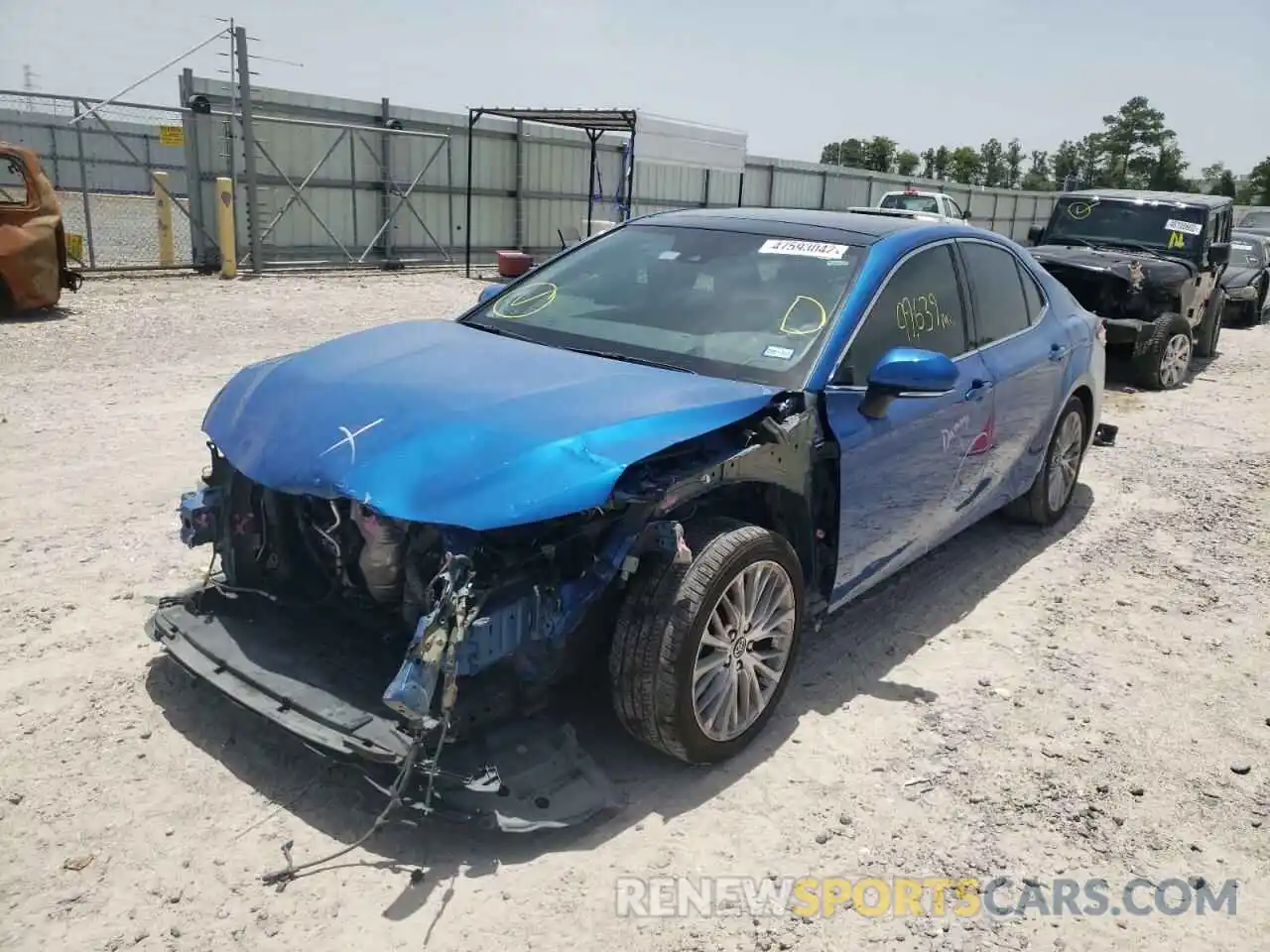 2 Photograph of a damaged car 4T1BZ1HK2KU024138 TOYOTA CAMRY 2019