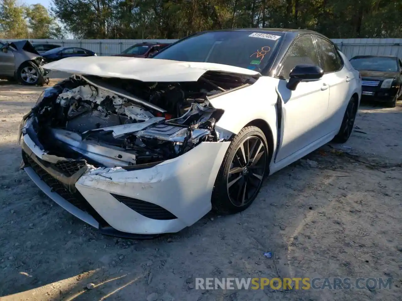 2 Photograph of a damaged car 4T1BZ1HK2KU025709 TOYOTA CAMRY 2019