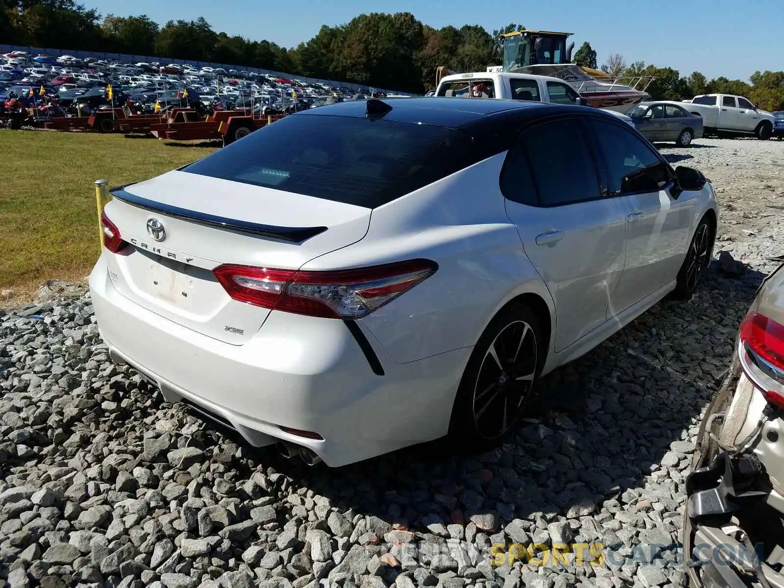 4 Photograph of a damaged car 4T1BZ1HK2KU025855 TOYOTA CAMRY 2019