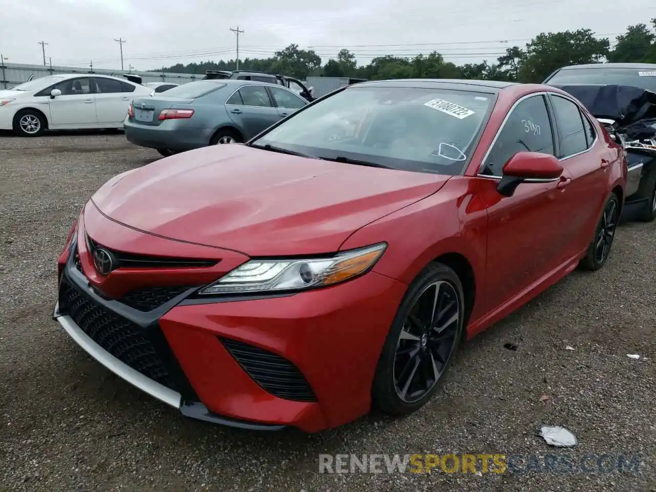 2 Photograph of a damaged car 4T1BZ1HK2KU029386 TOYOTA CAMRY 2019