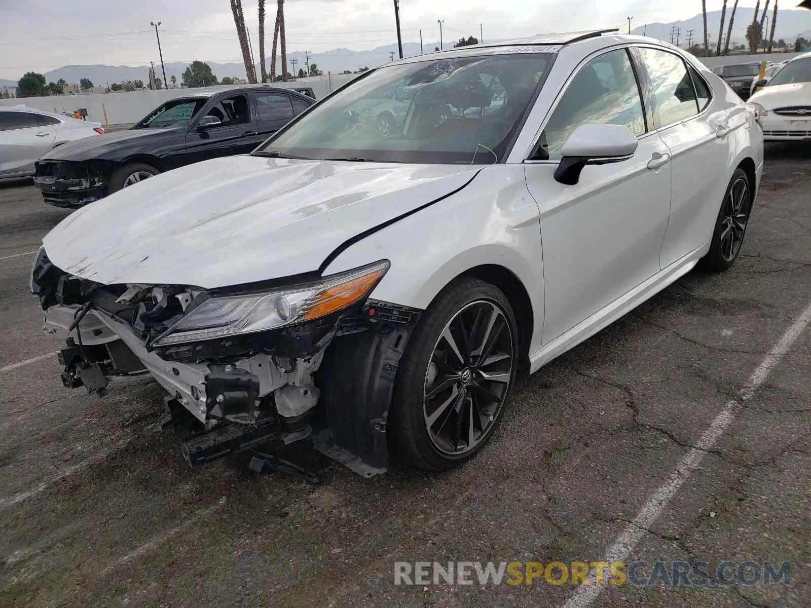 2 Photograph of a damaged car 4T1BZ1HK2KU030392 TOYOTA CAMRY 2019